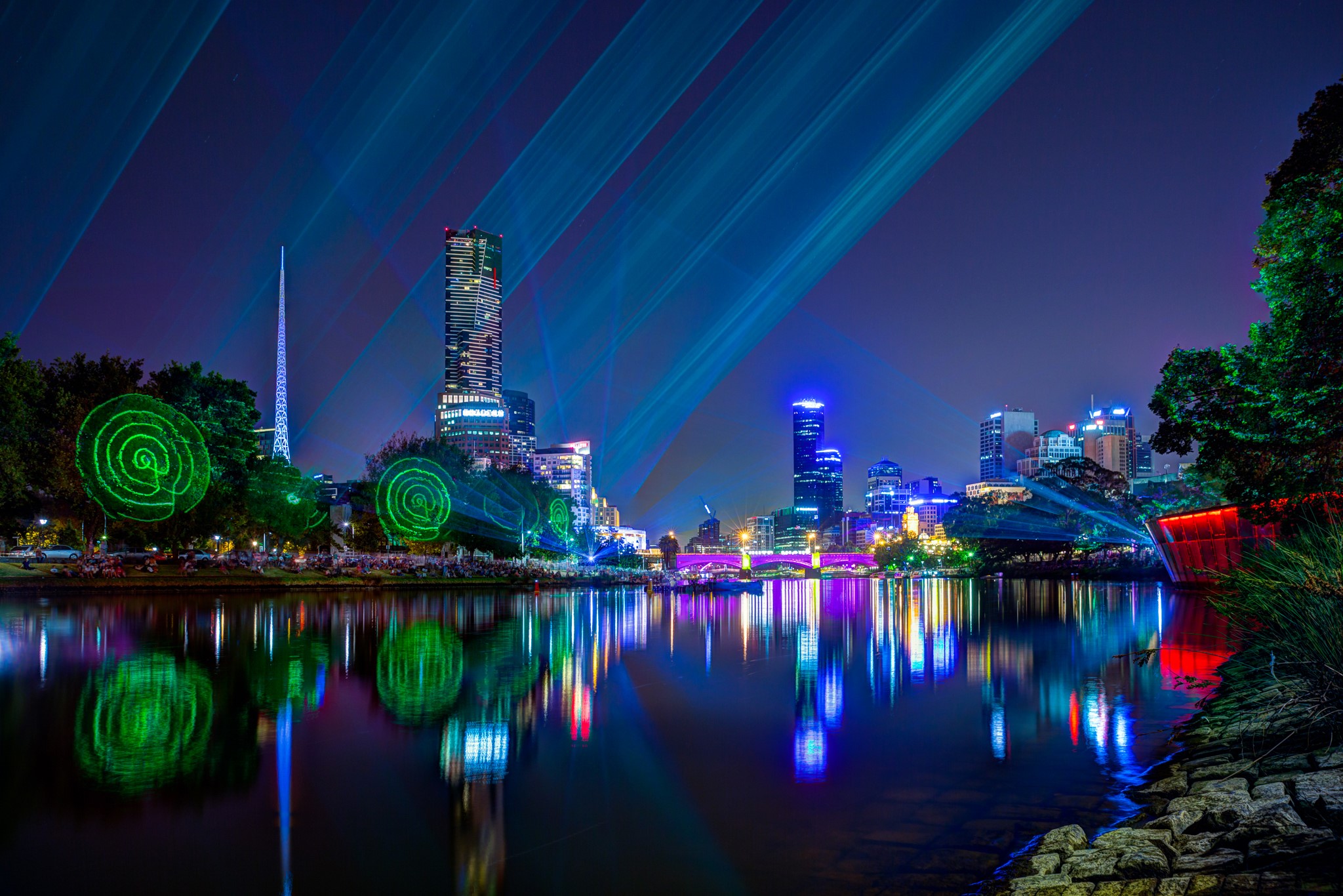 Melbourne skyline and Yarra River at night with light show HD Wallpaper