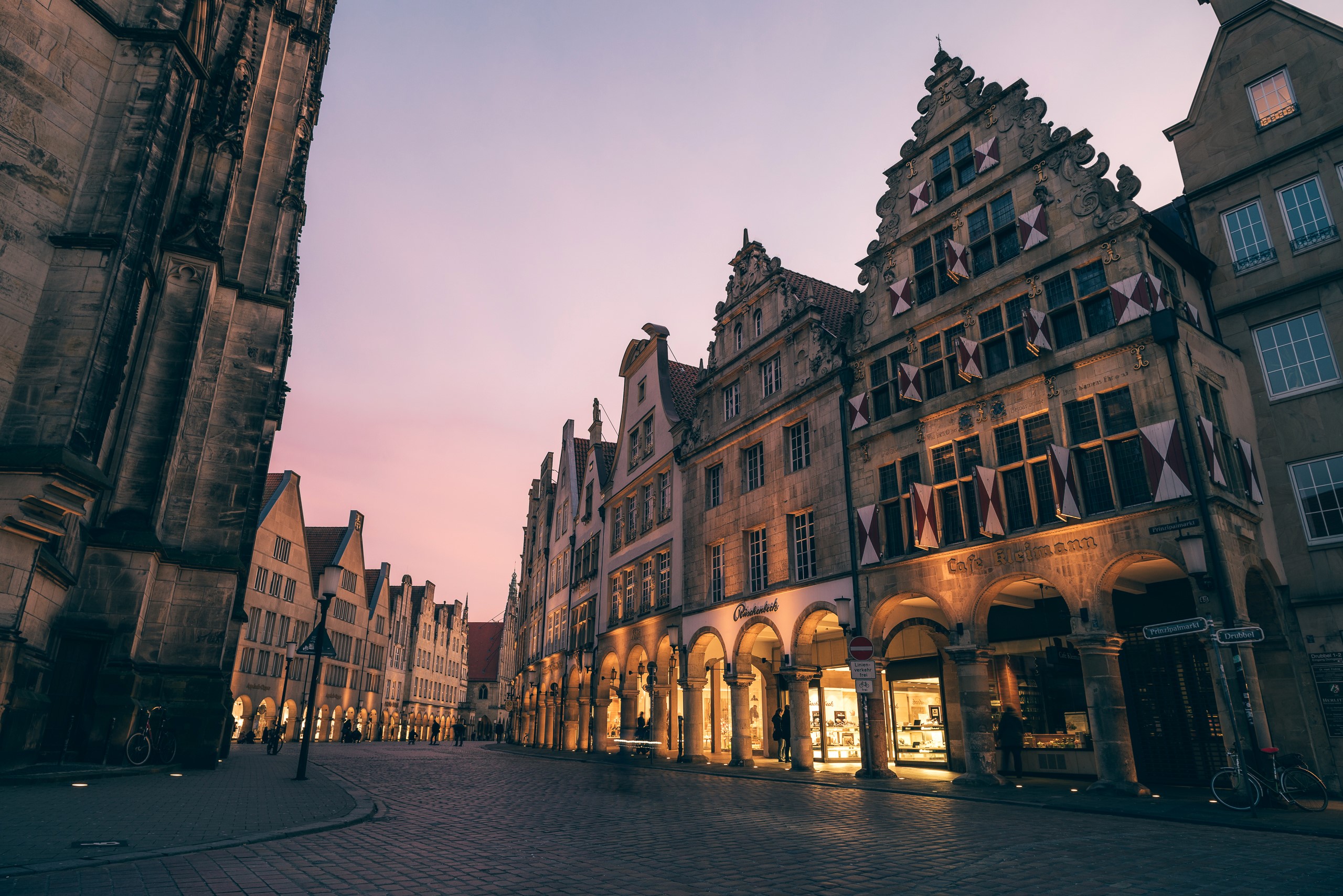 Historic buildings on a street in Germany at dusk HD Wallpaper