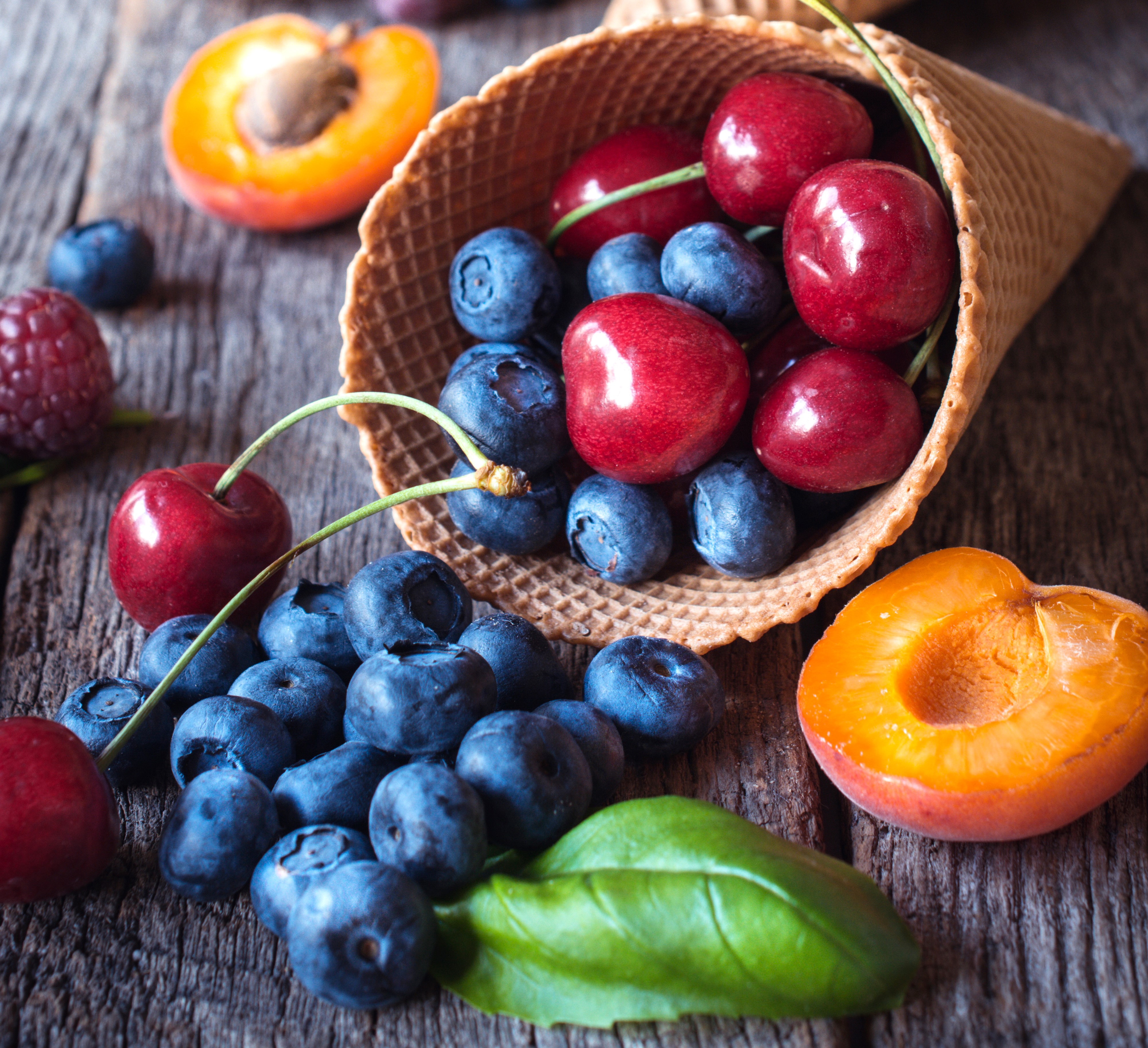 4K Fruit: Blueberries, Cherries, and Peaches in a Waffle Cone HD Wallpaper