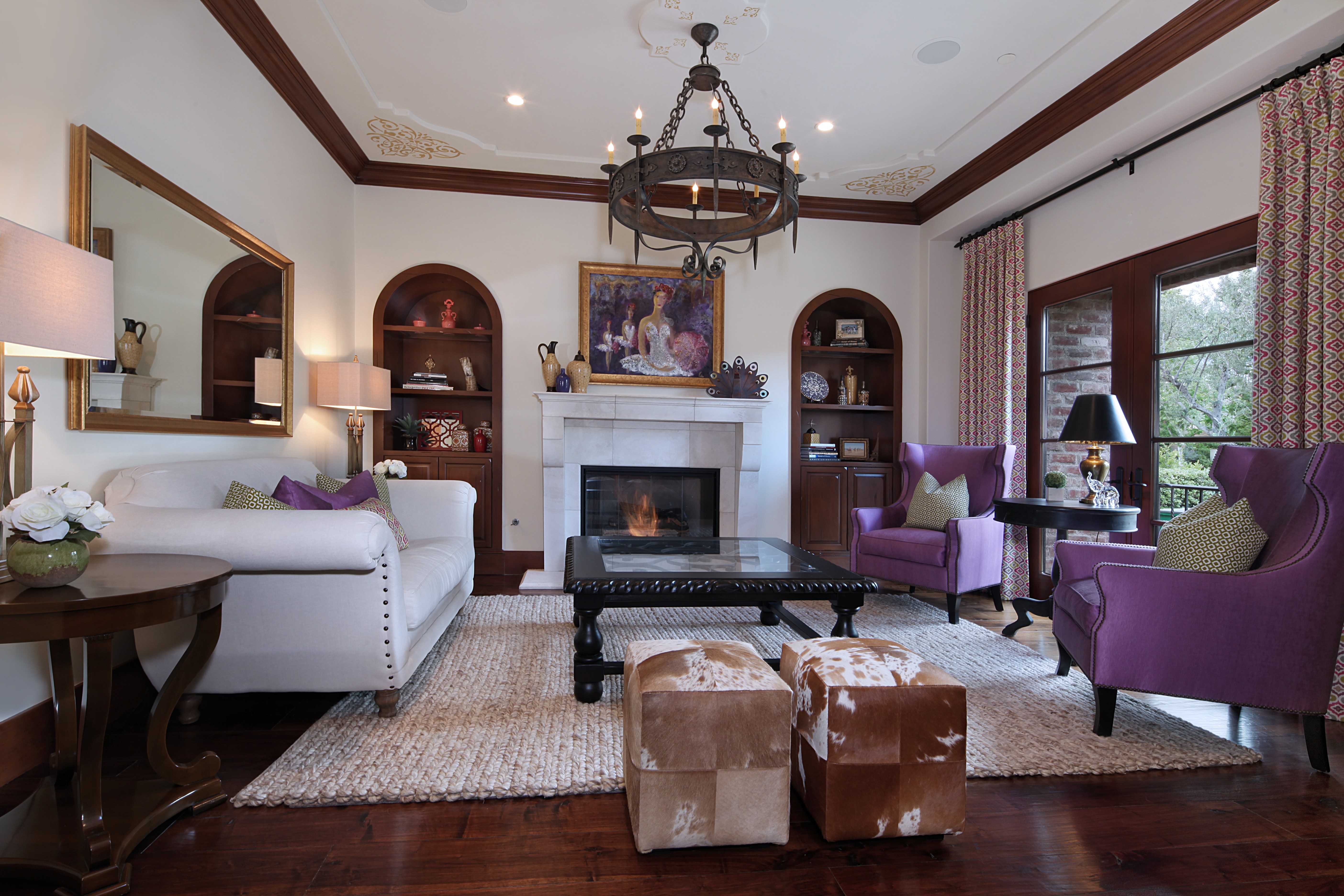 Living room with sofa, armchairs, and chandelier HD Wallpaper