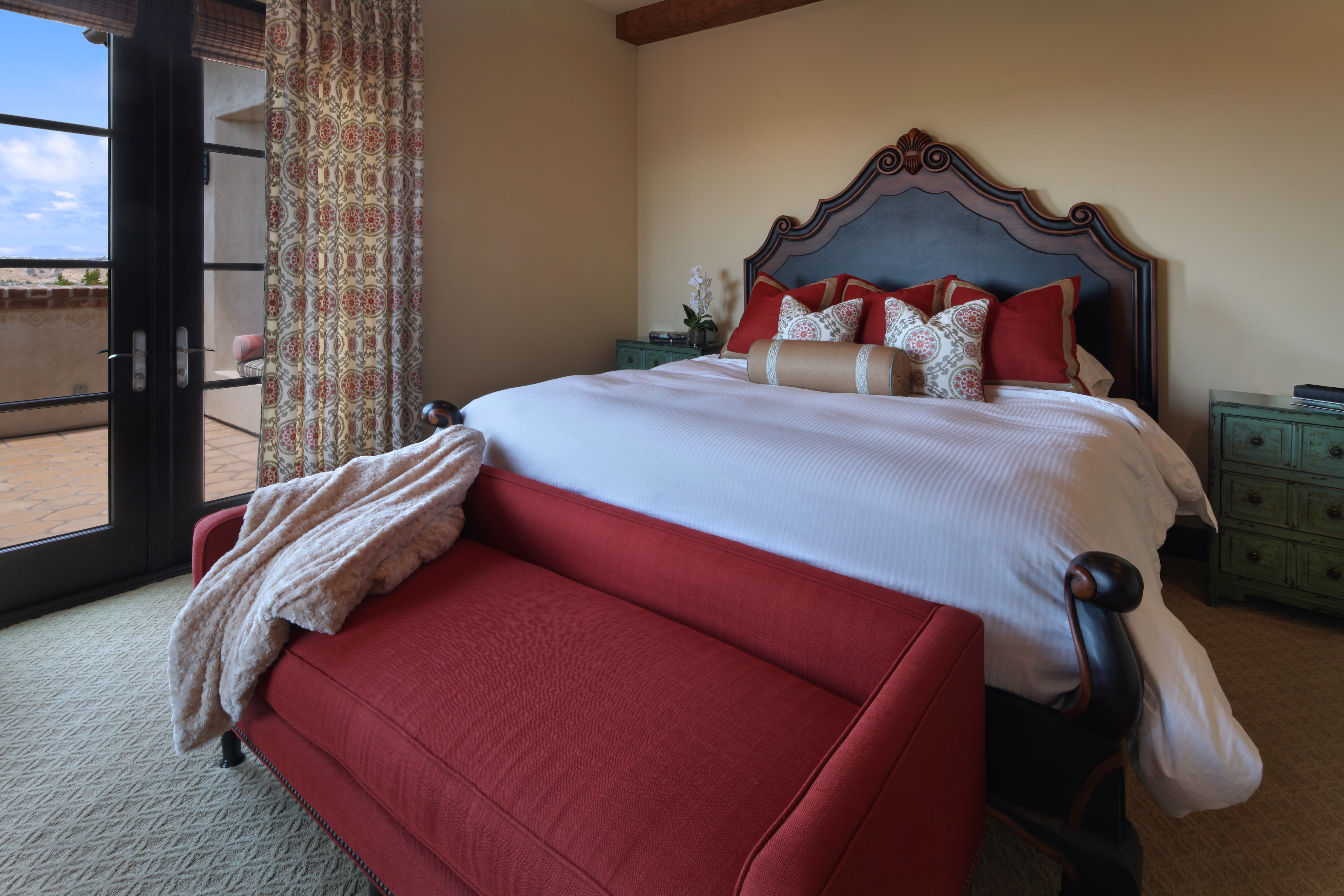 Bedroom with bed, sofa, and balcony door HD Wallpaper