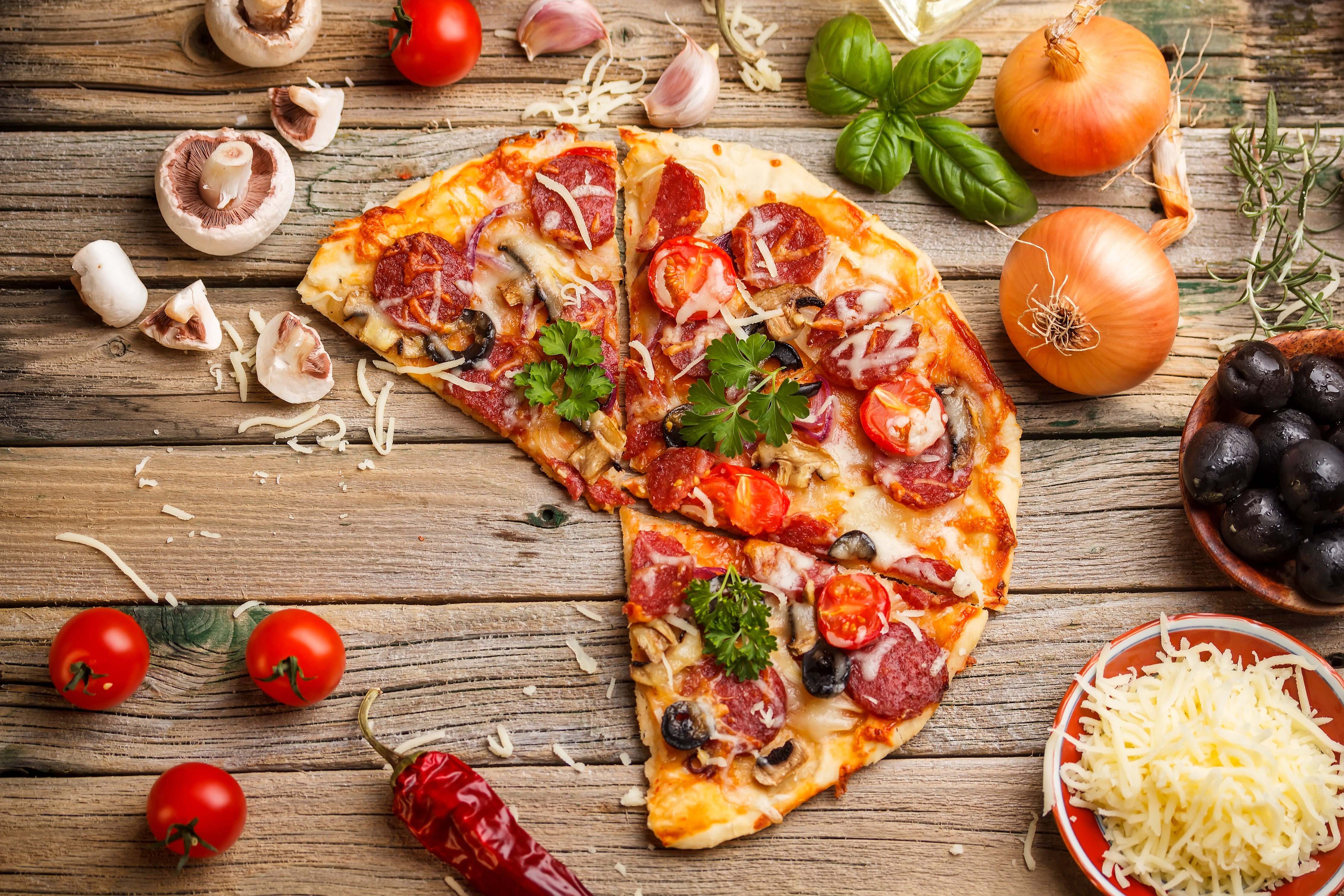 Pizza with Salami, Tomatoes, Mushrooms, and Olives HD Wallpaper