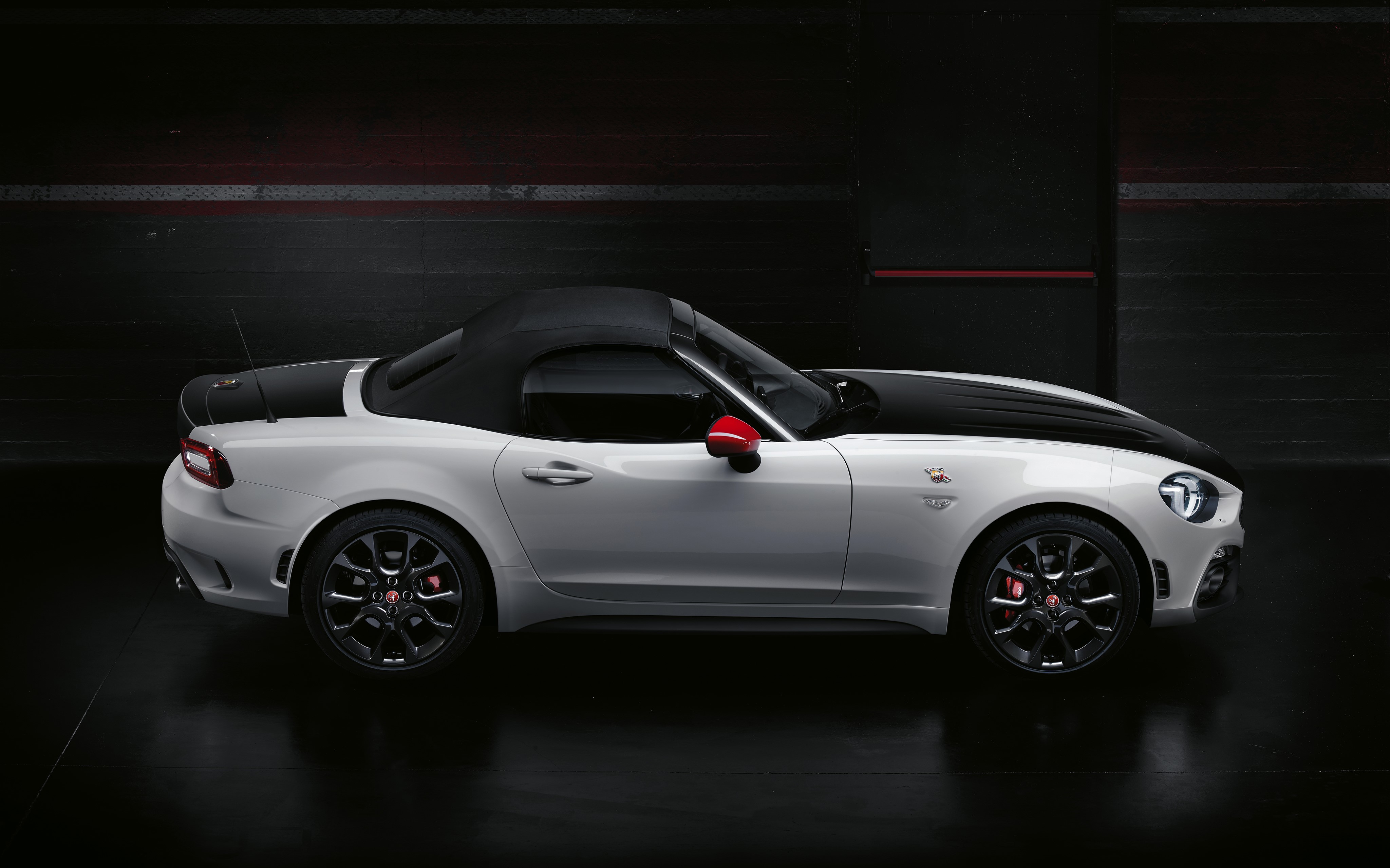 White Abarth 124 Spider convertible with black accents HD Wallpaper