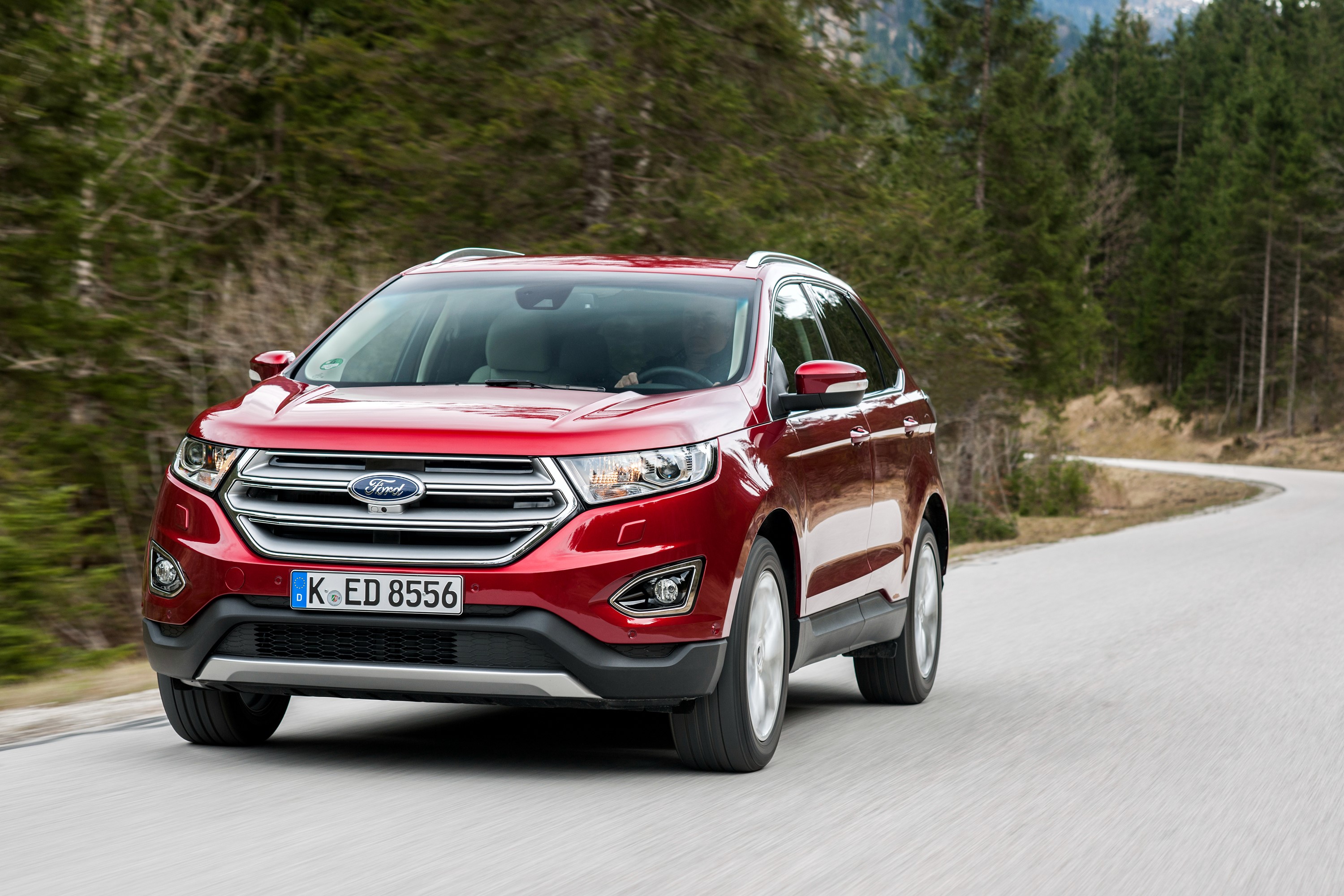 Red Ford Edge driving on a winding road HD Wallpaper