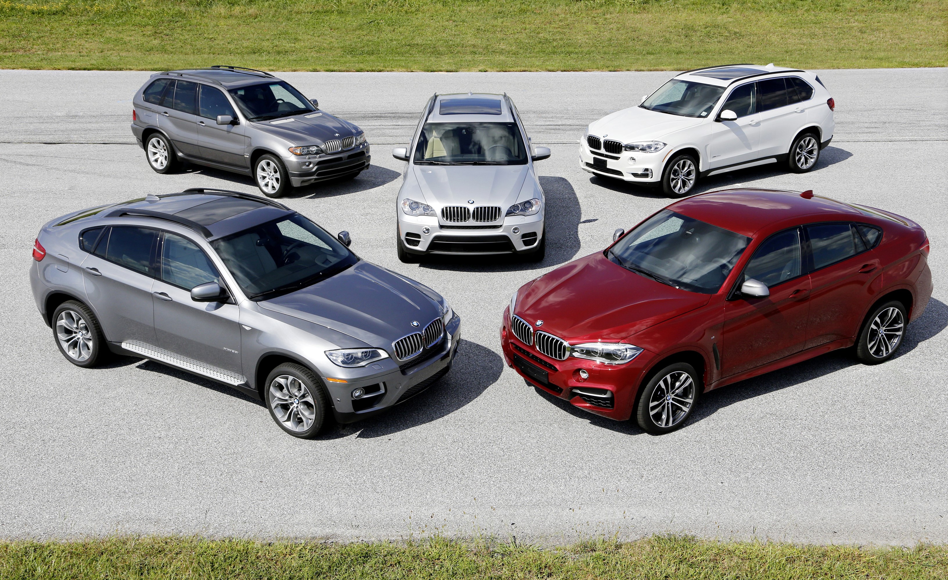 Five BMW SUVs and Coupes on Asphalt HD Wallpaper