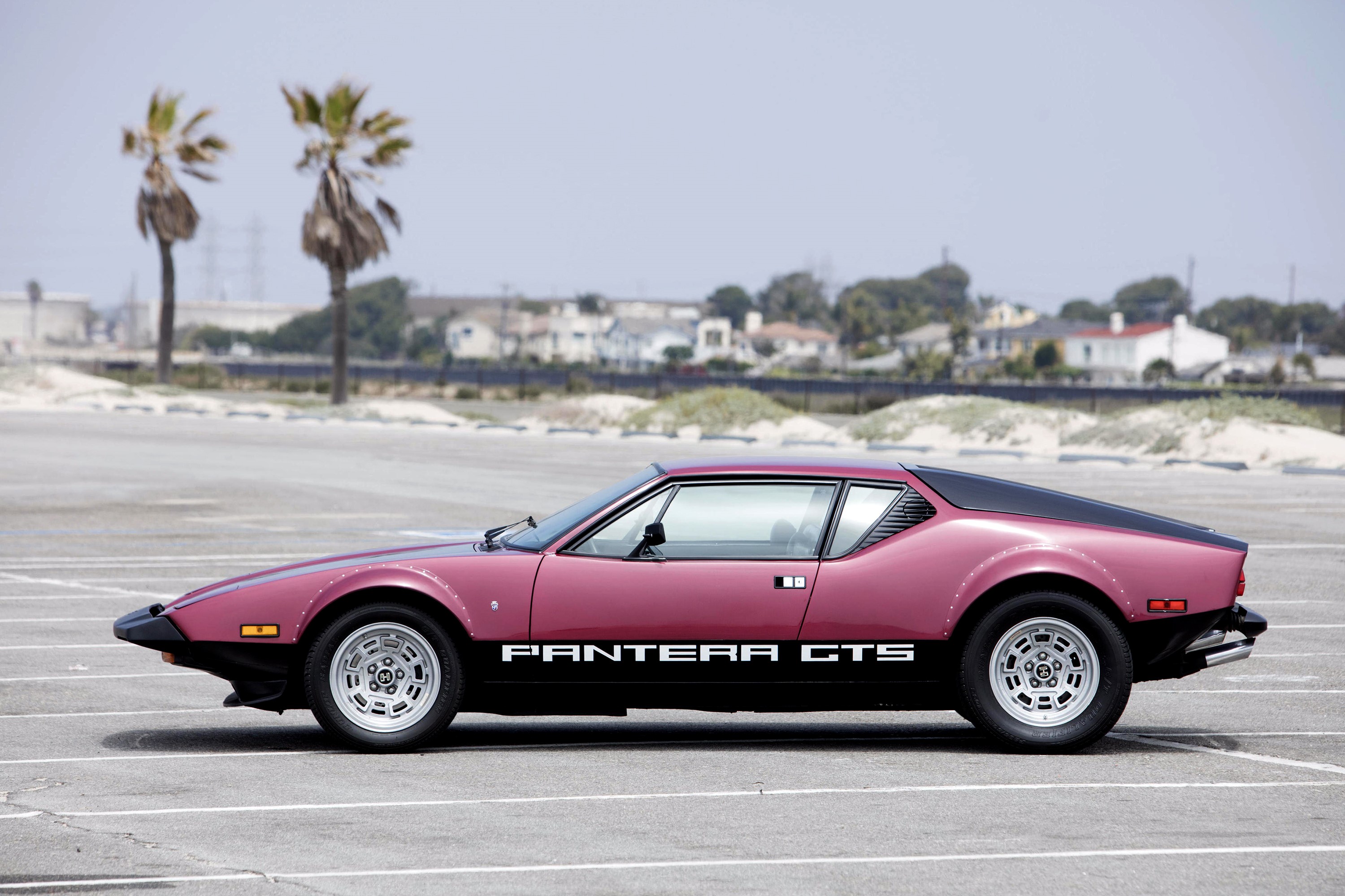 1974 De Tomaso Pantera GTS parked by the beach HD Wallpaper