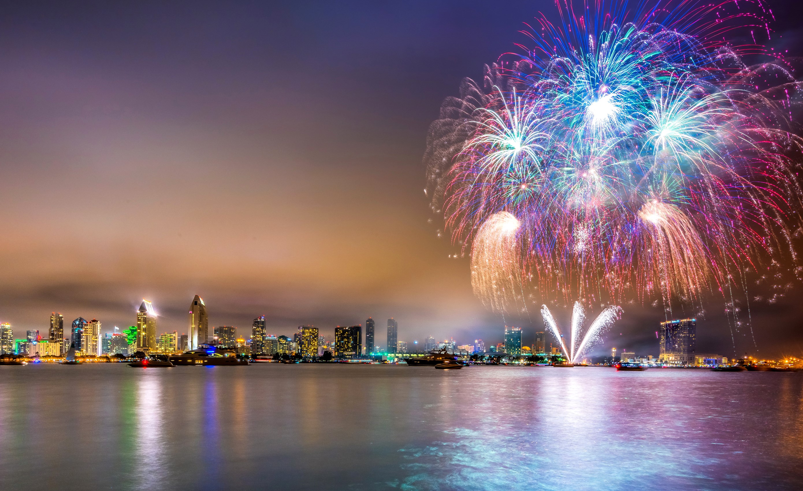 San Diego Skyline with Fireworks over the Ocean at Night HD Wallpaper