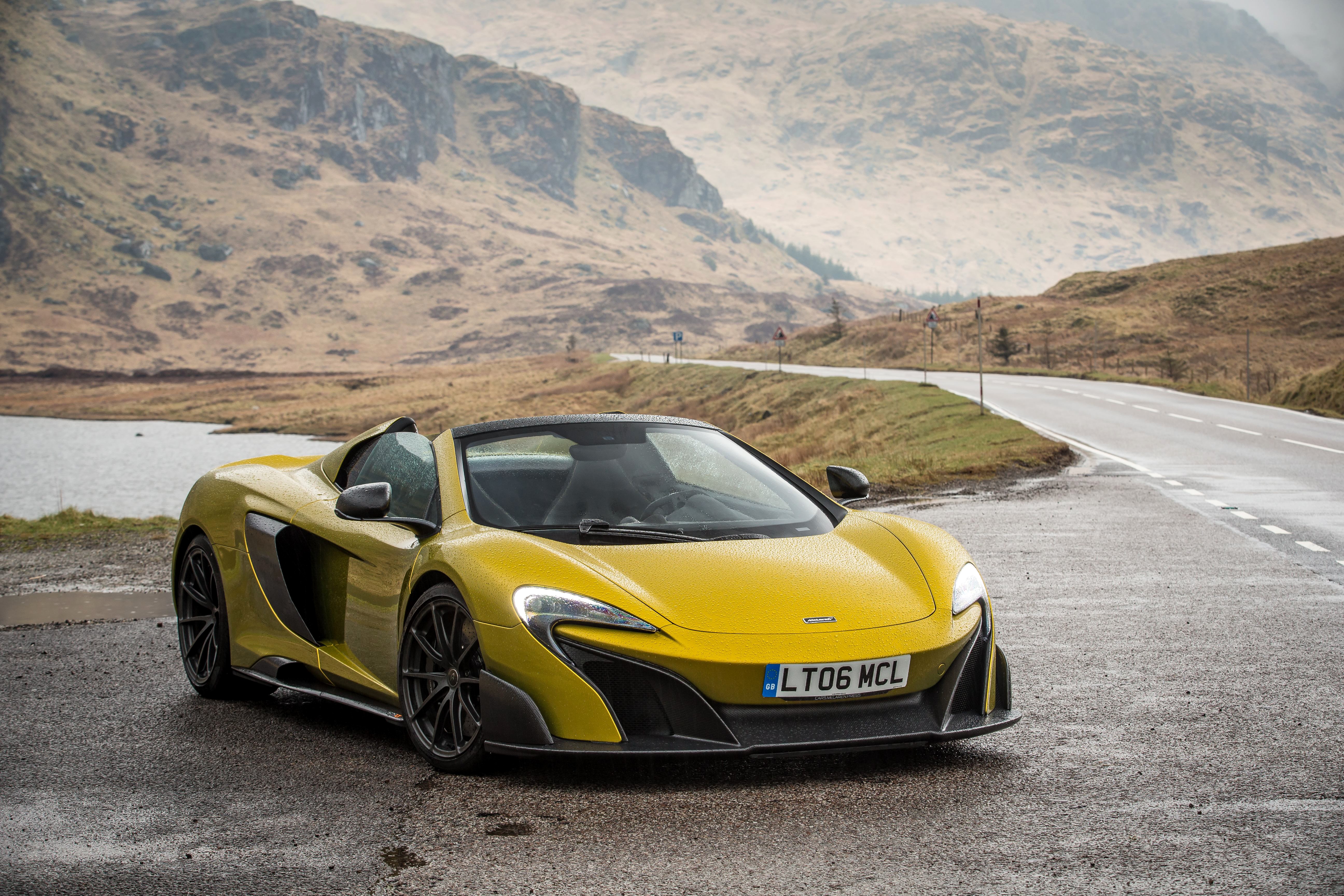 Yellow McLaren 675 LT Spider on a Wet Road HD Wallpaper