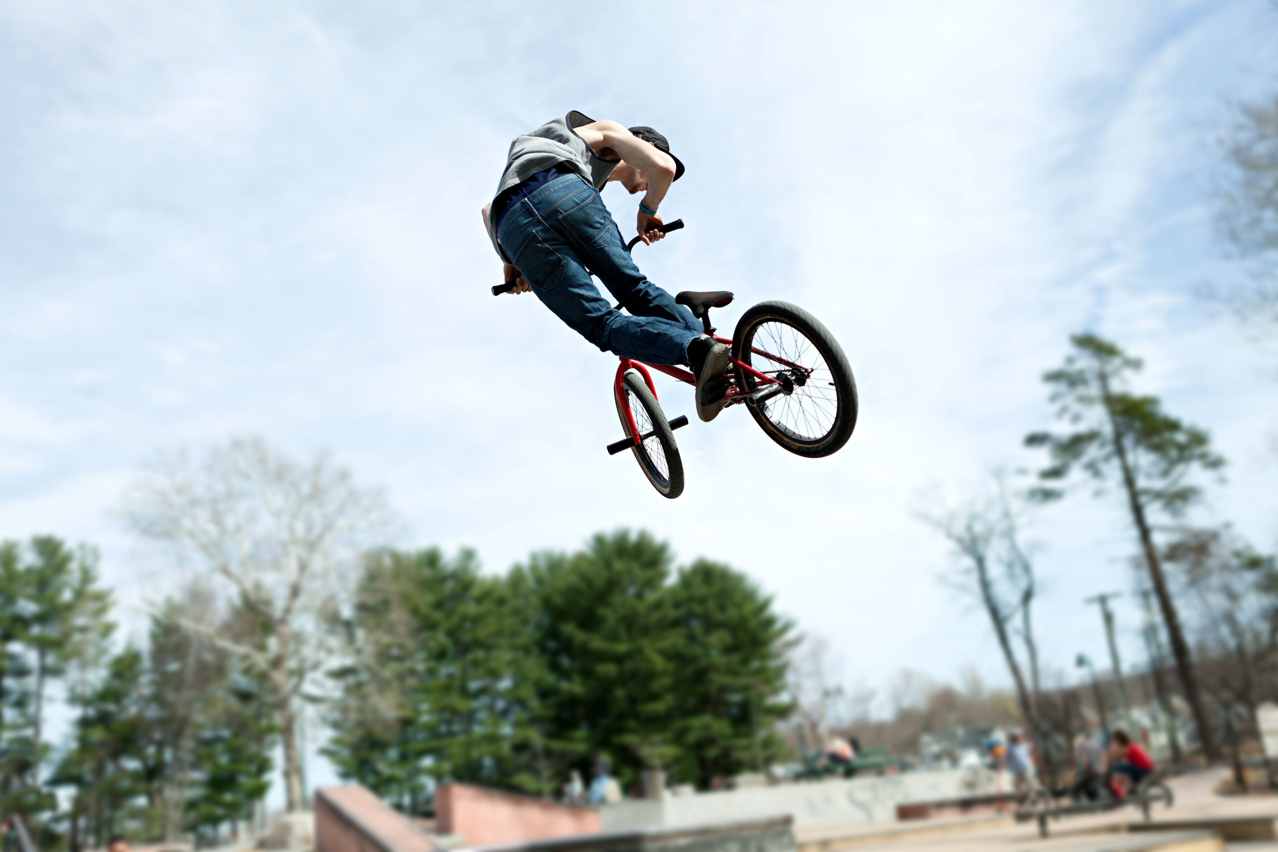BMX rider performing a jump HD Wallpaper