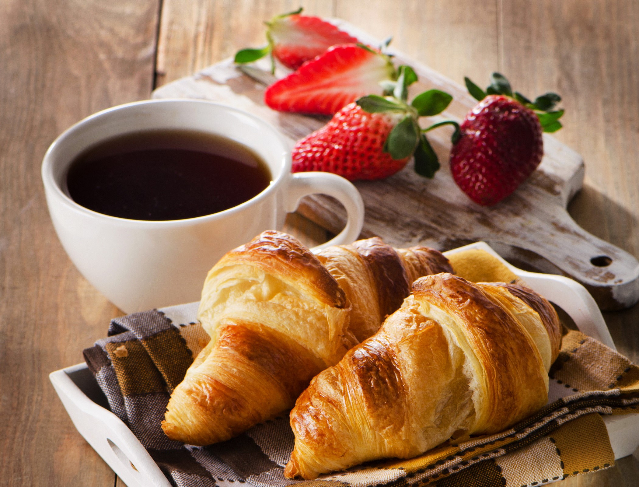 Coffee, Croissants, and Strawberries on a Wooden Table HD Wallpaper