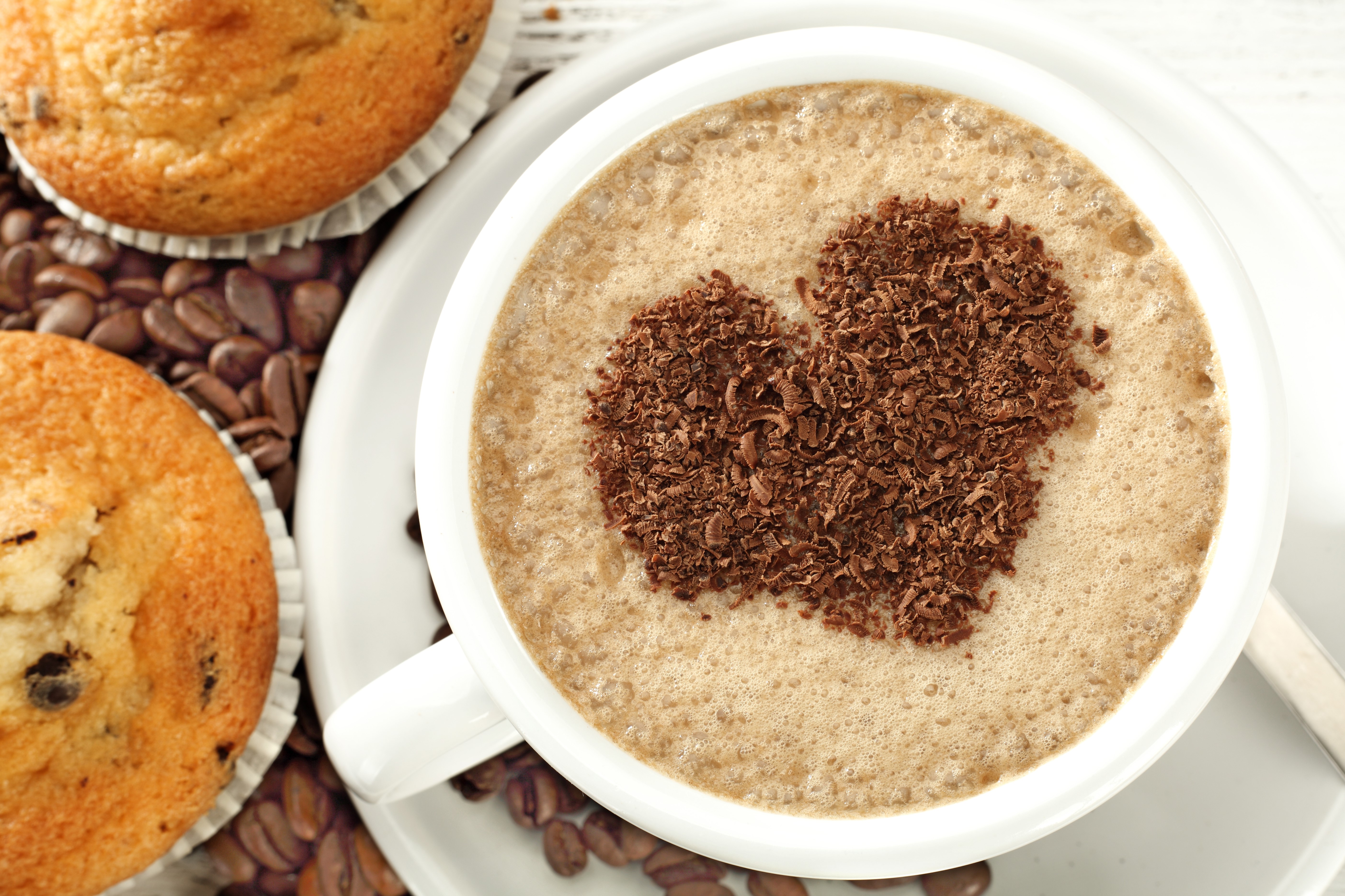 Coffee cup with chocolate heart, muffins, and coffee beans HD Wallpaper