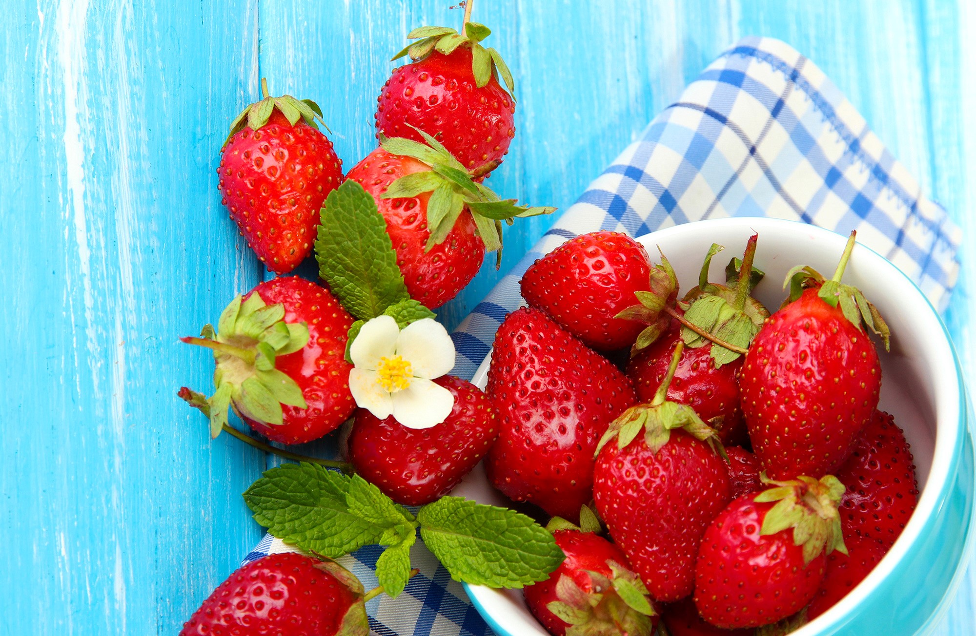 Strawberries and mint on a blue wooden table HD Wallpaper