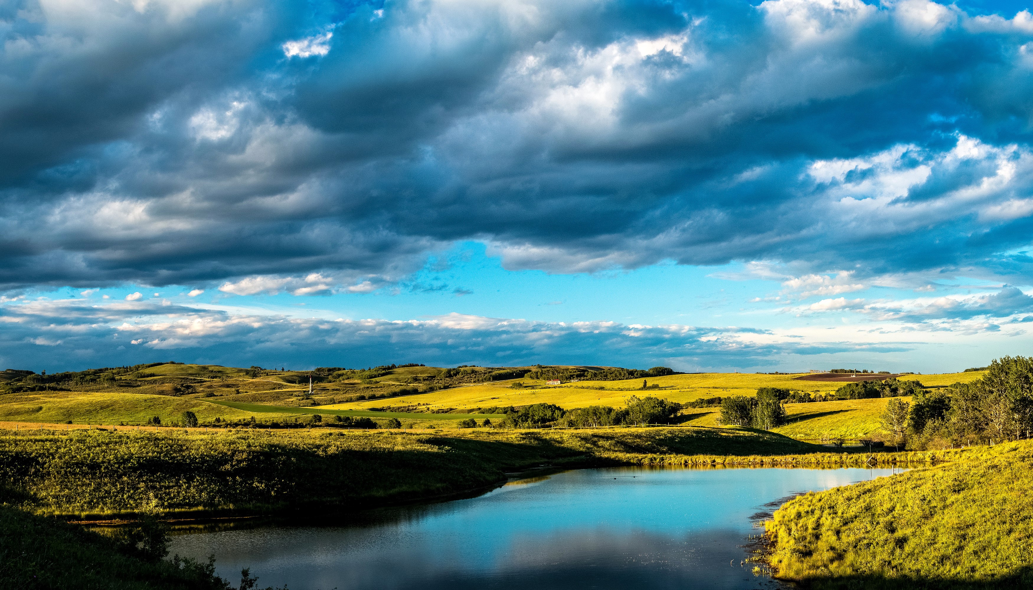 Turner Valley Alberta Canada Landscape with Pond and Clouds HD Wallpaper