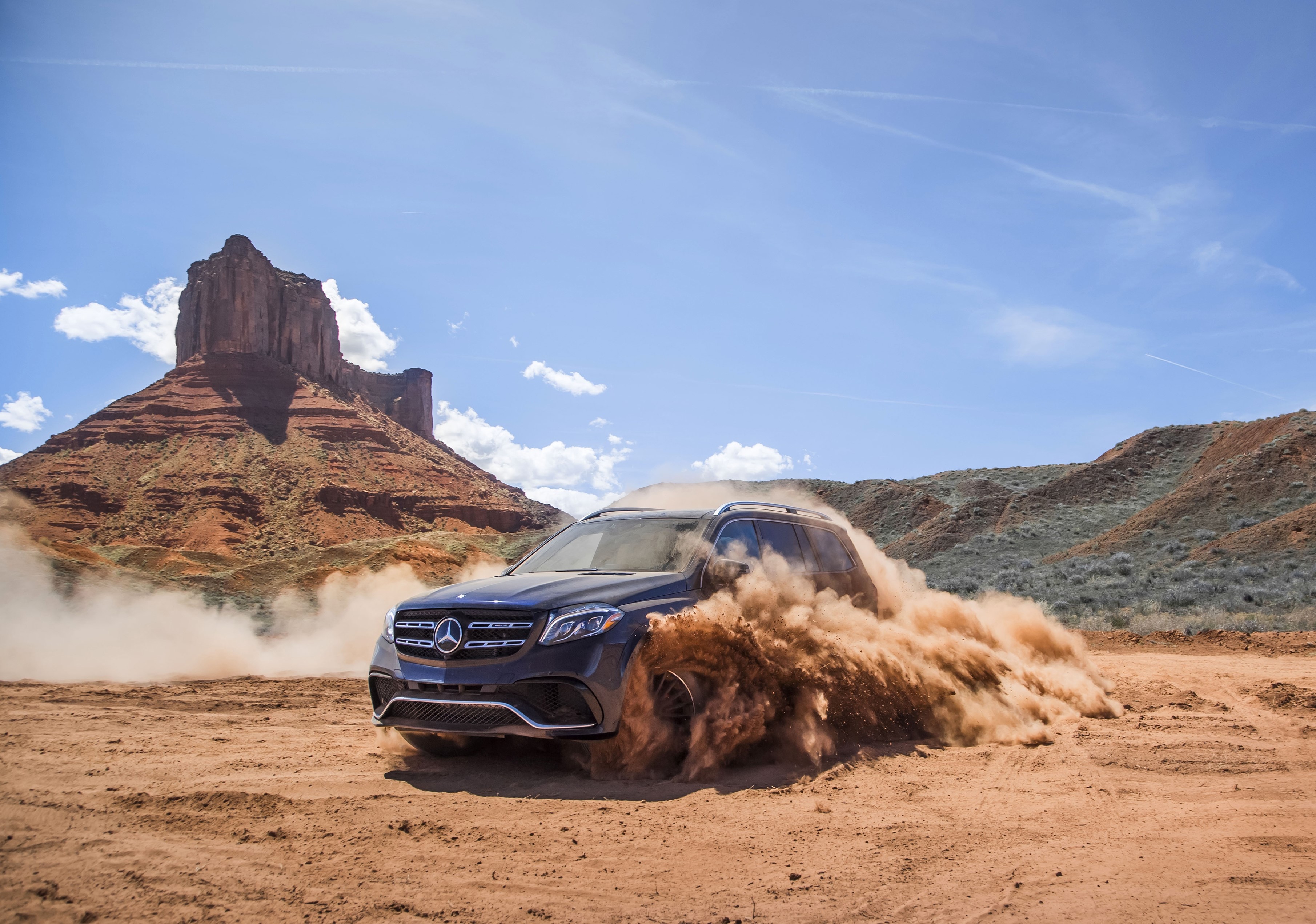 2017 Mercedes-Benz AMG GLS 63 4MATIC driving in desert HD Wallpaper