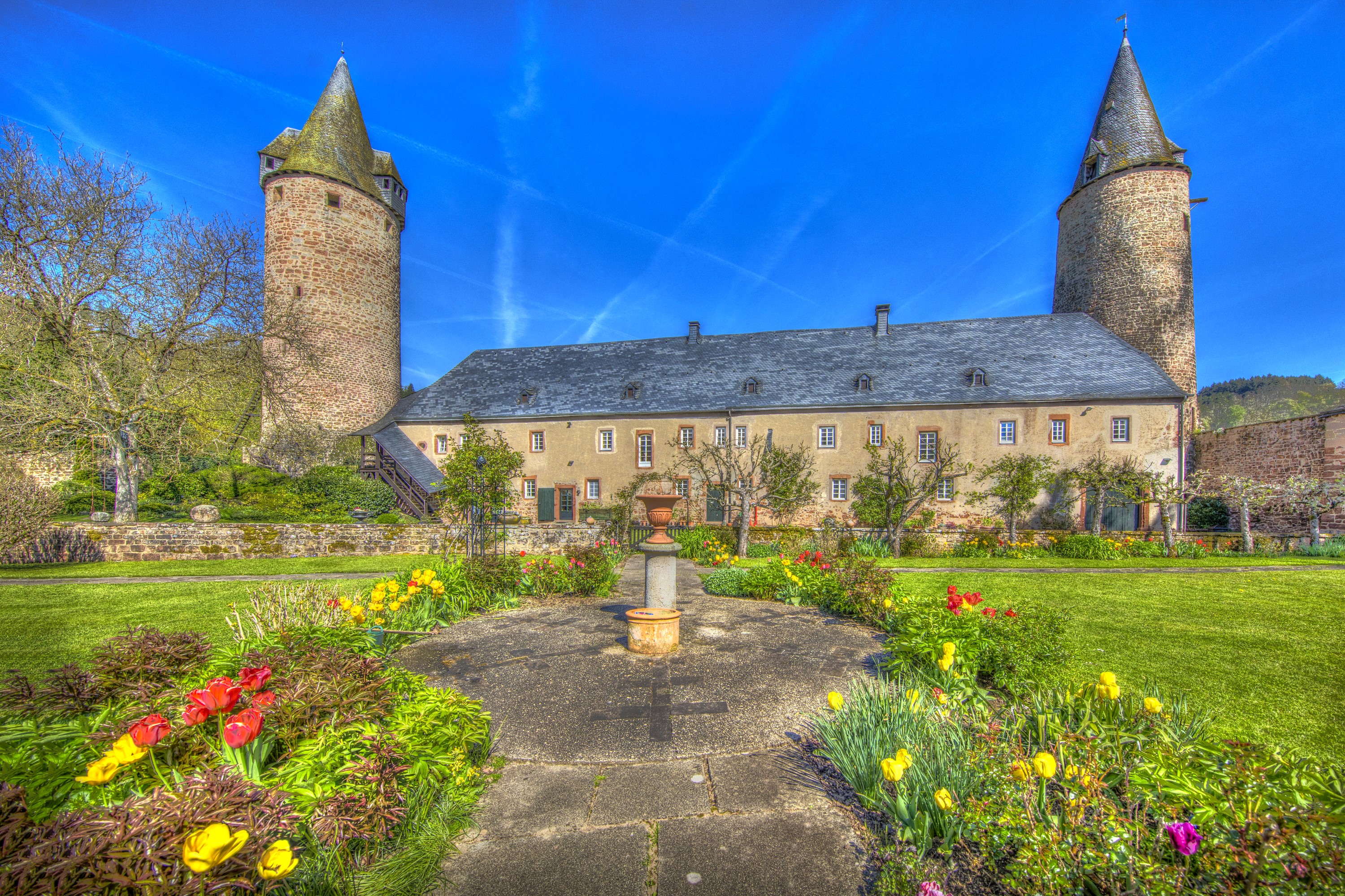 Castle in Dreis, Germany with Tulips and Lawn HD Wallpaper