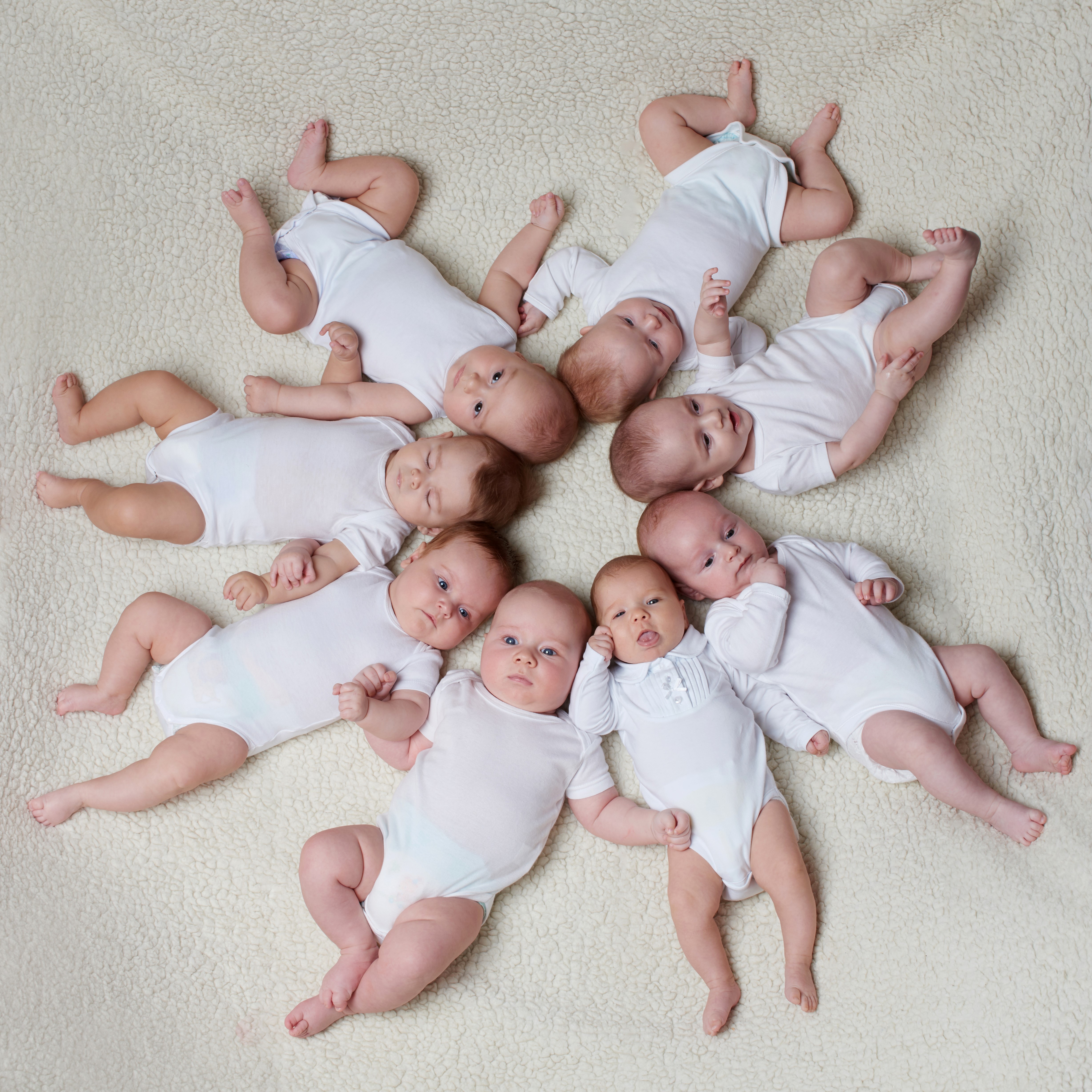 Many Infants in White Onesies HD Wallpaper