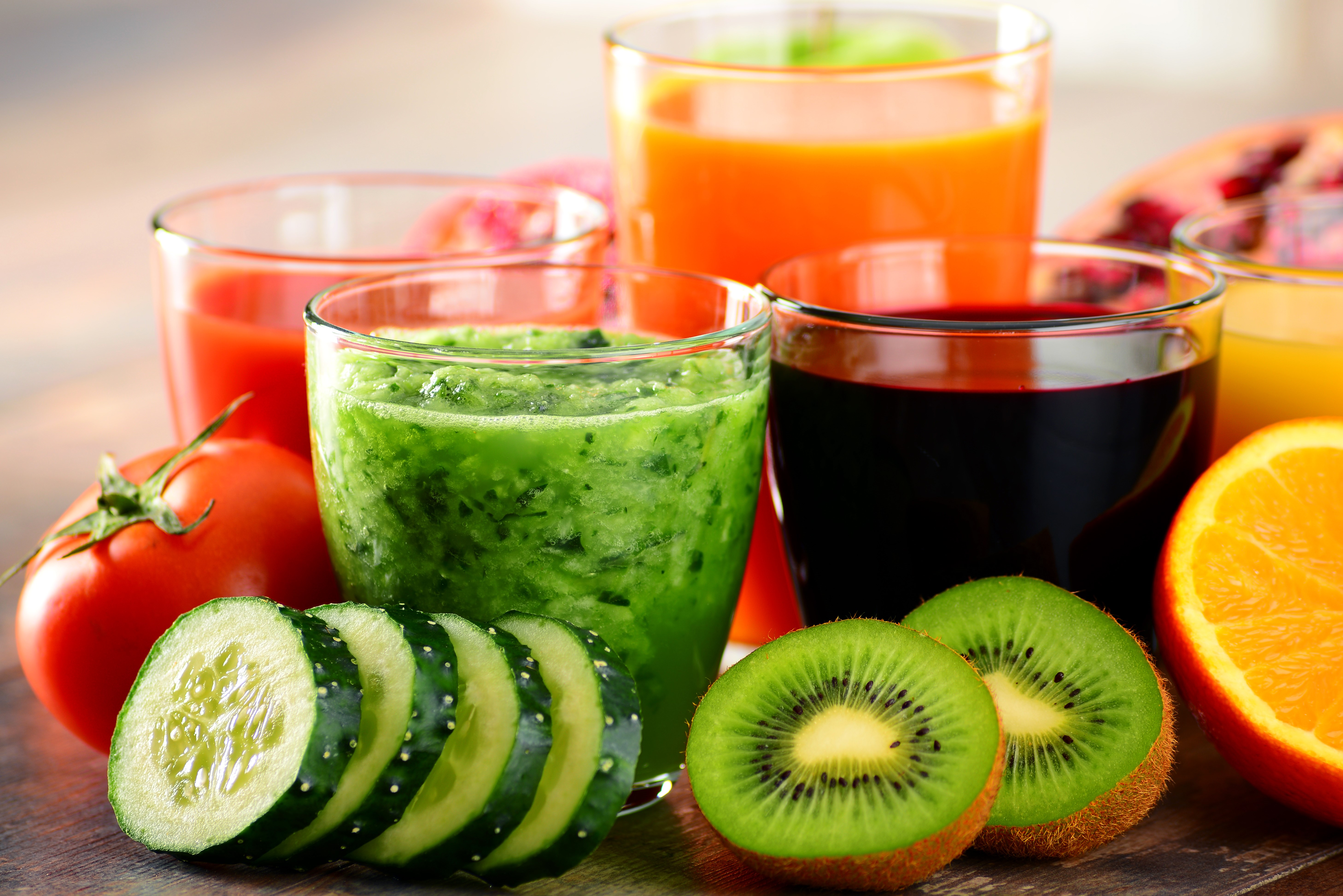 Assortment of Fresh Juices and Fruits HD Wallpaper