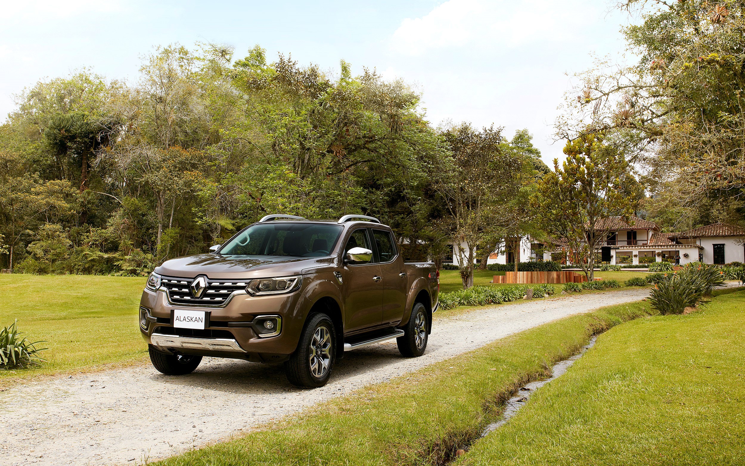 Renault Alaskan pickup truck on a dirt road HD Wallpaper