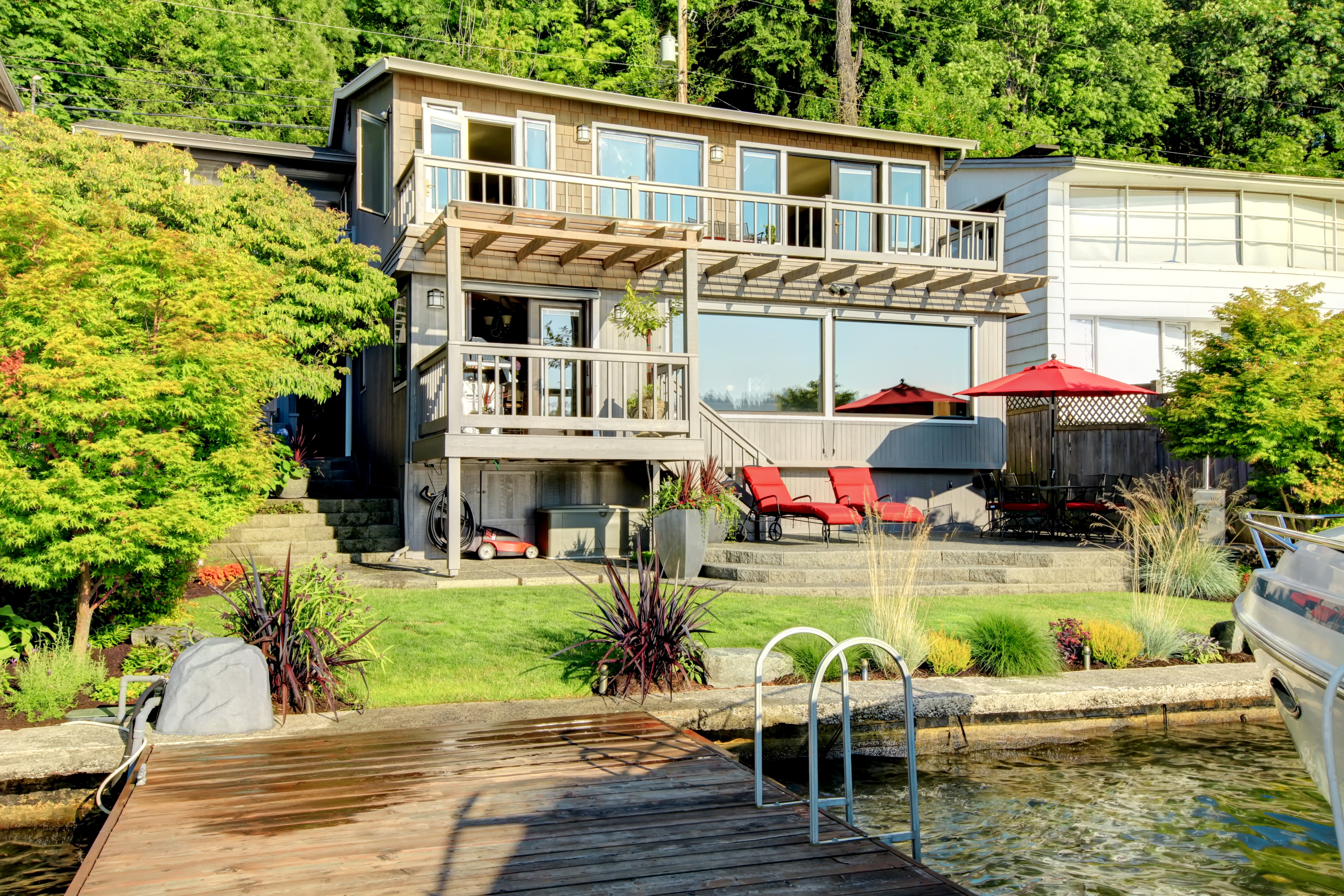 House with a dock on the water HD Wallpaper