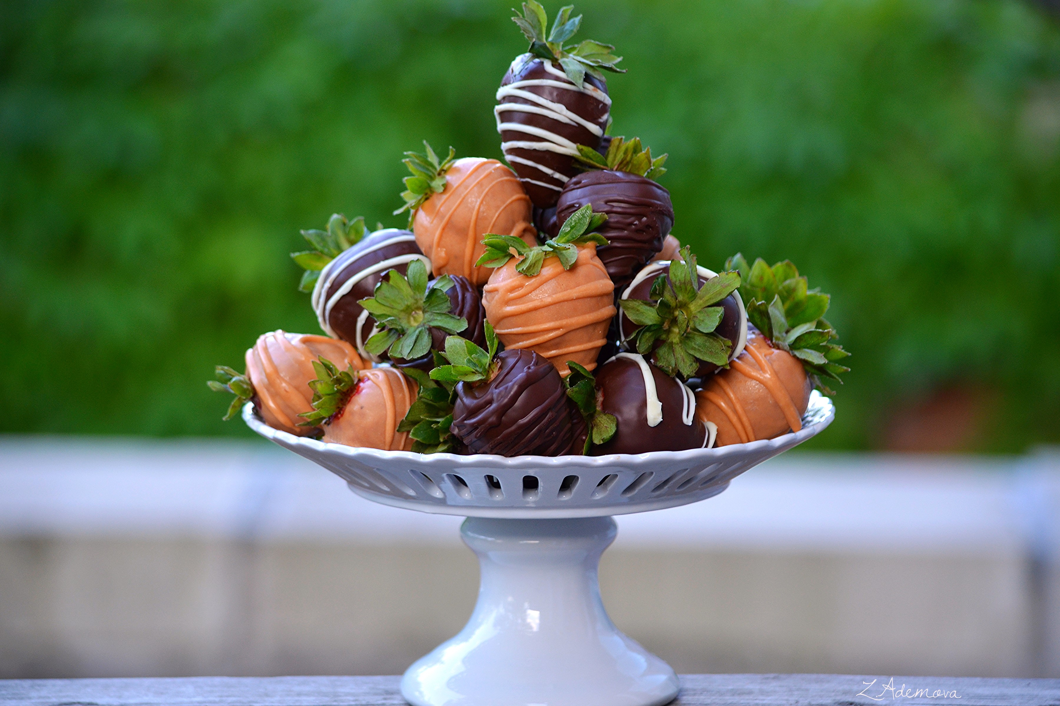 Chocolate-covered strawberries on a cake stand HD Wallpaper