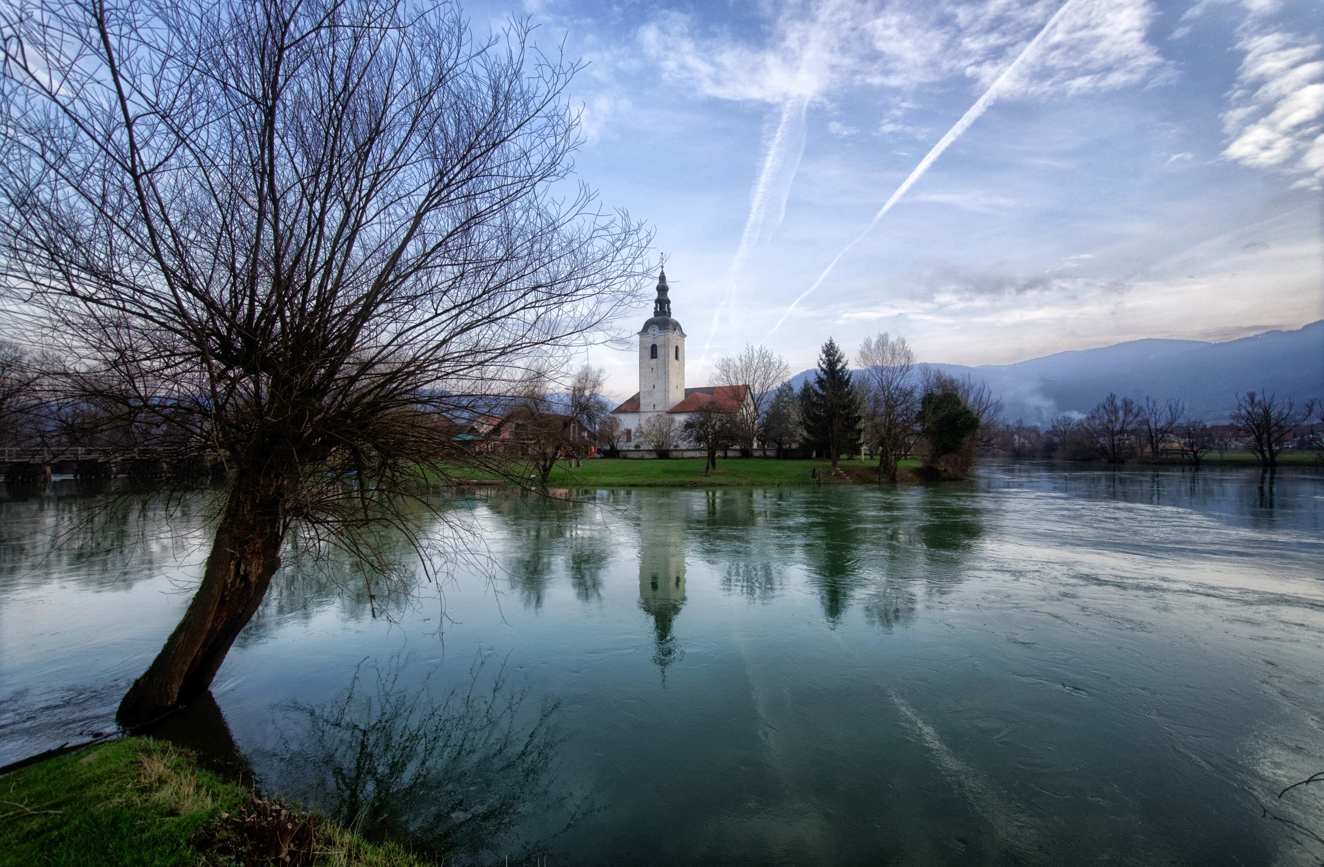 Church and river in Kostanjevica, Slovenia HD Wallpaper