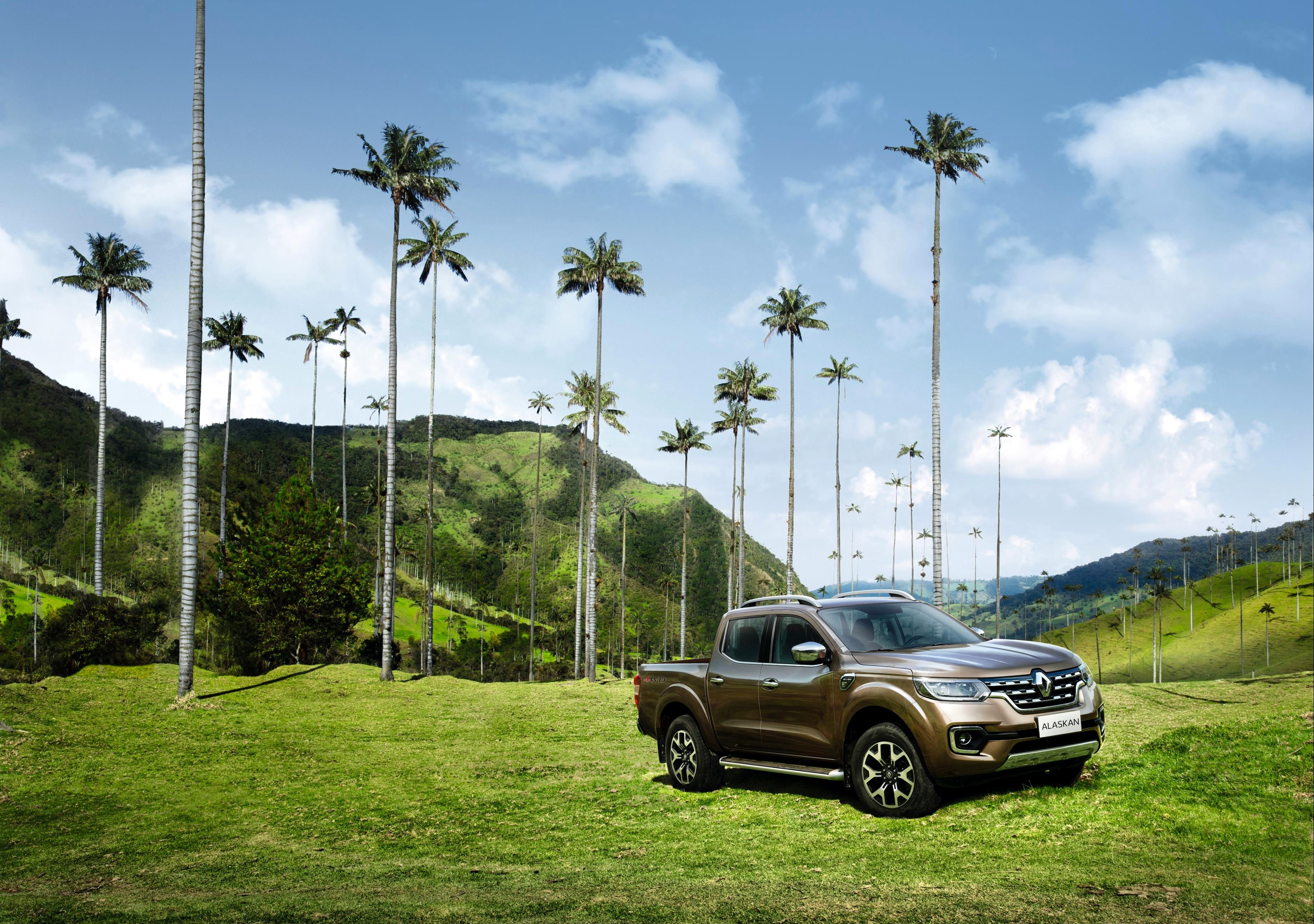Renault Alaskan pickup truck in a field of palm trees HD Wallpaper