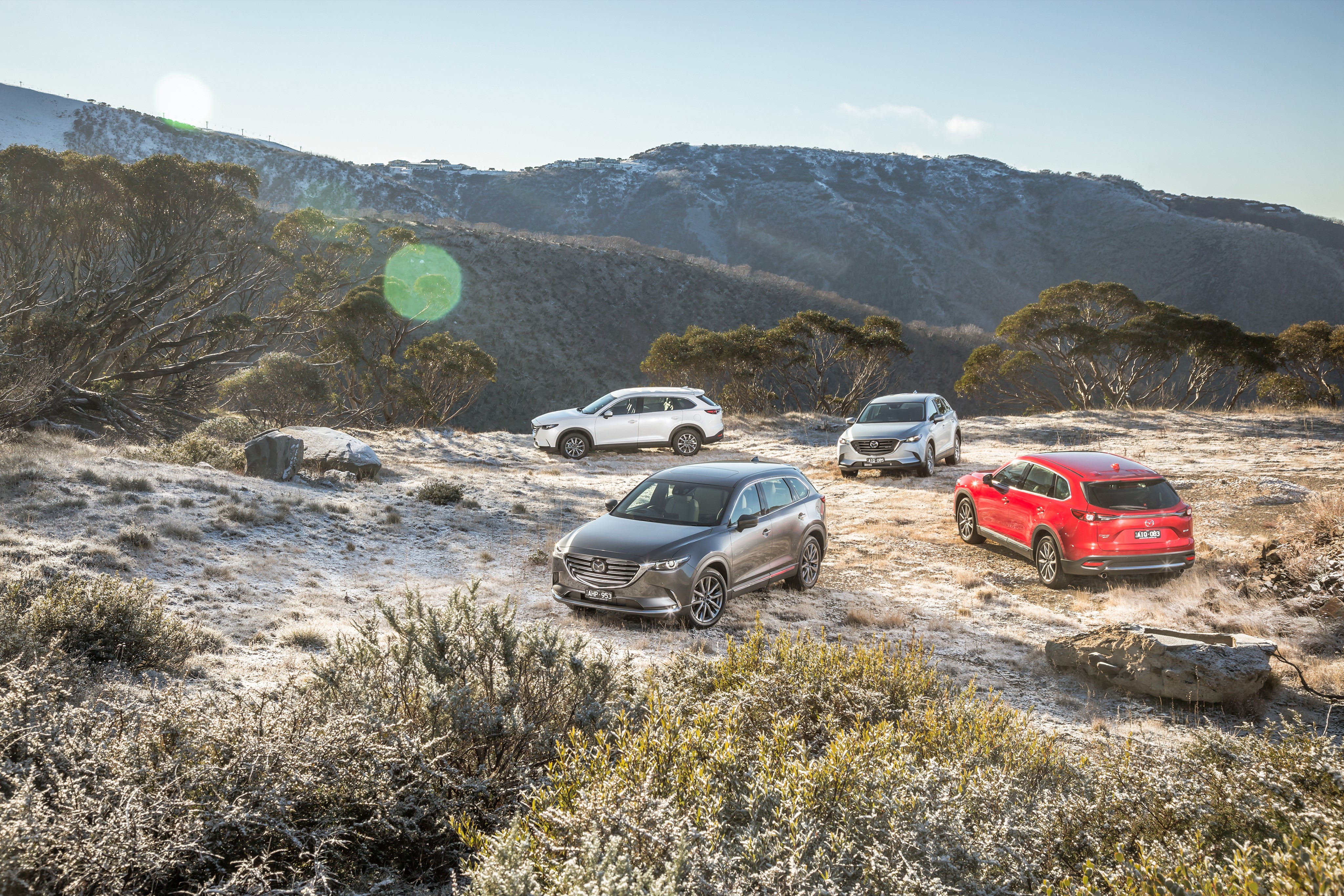 Mazda CX-9 SUVs in a Mountain Landscape HD Wallpaper