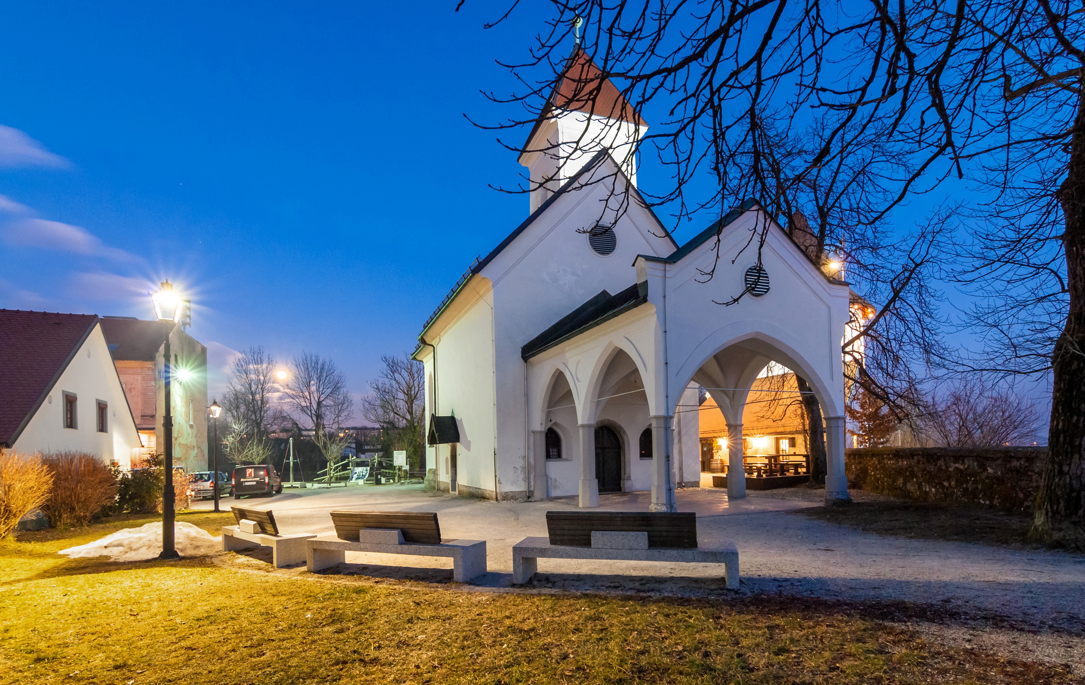 Church with Arches and Benches at Night in Slovenia HD Wallpaper