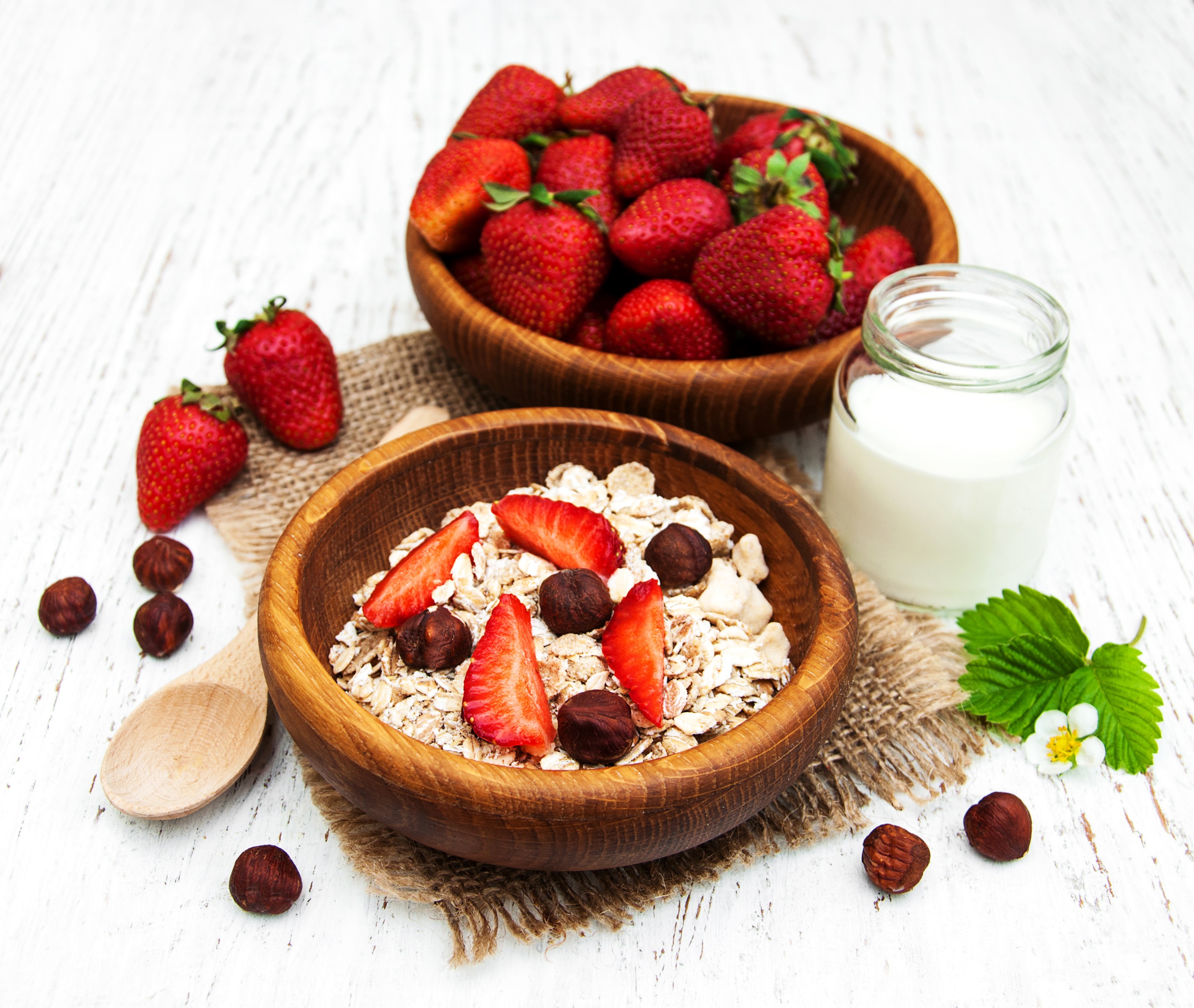 Muesli with strawberries, nuts, and milk HD Wallpaper