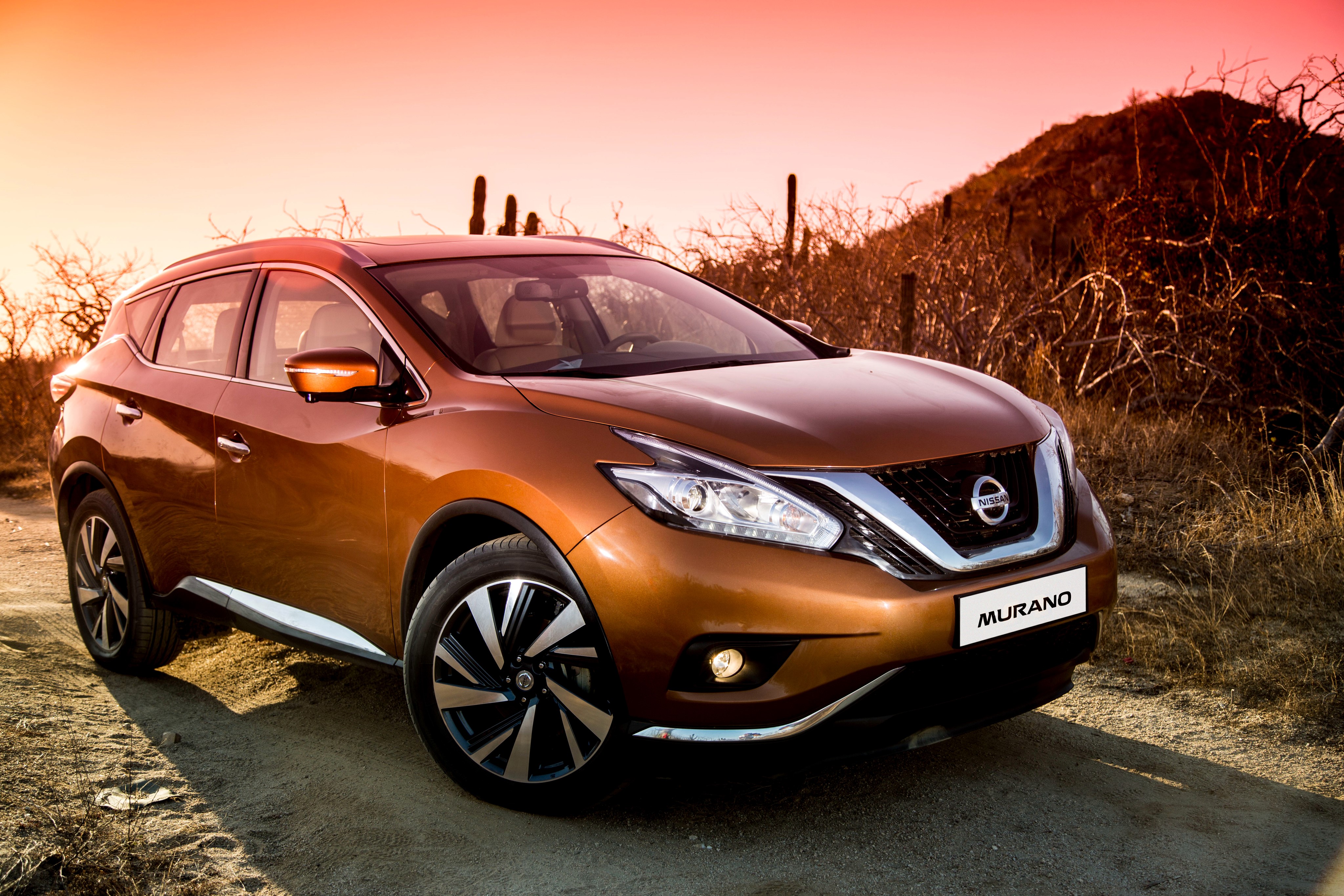 2016 Nissan Murano in desert landscape HD Wallpaper