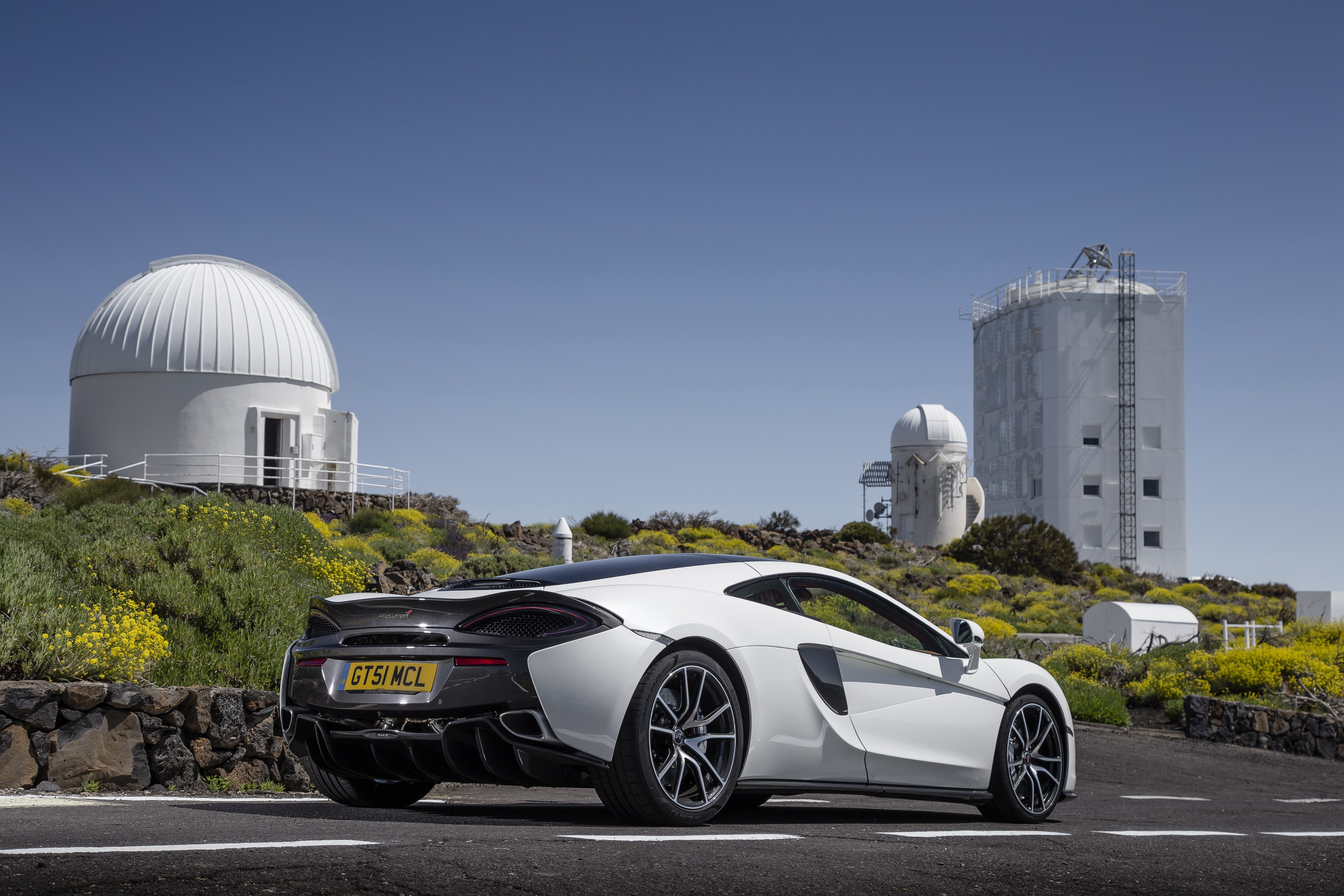 White McLaren 570GT at observatory HD Wallpaper