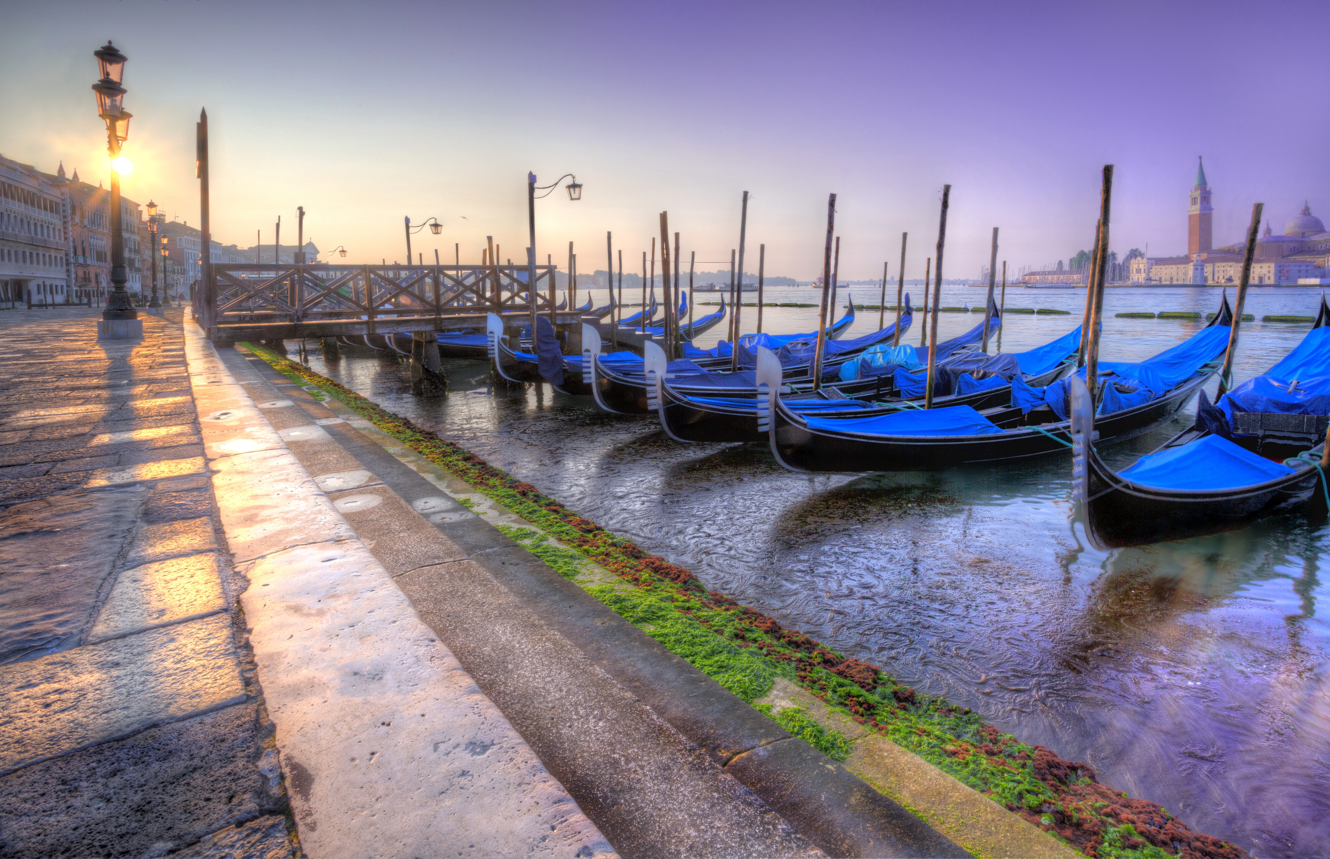Gondolas docked in Venice canal at sunrise HD Wallpaper