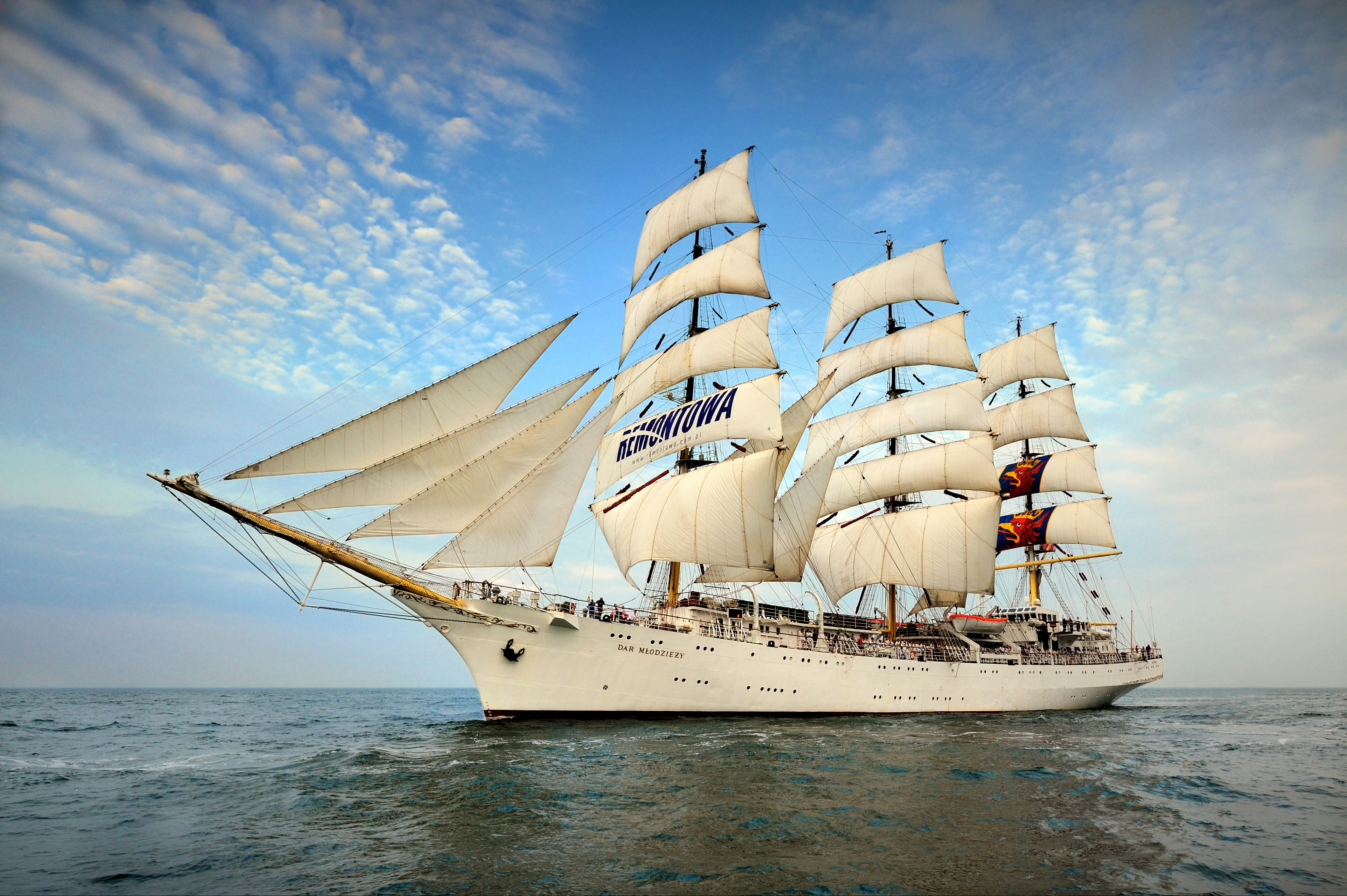 Tall Ship Dar Mlodziezy sailing on the sea HD Wallpaper
