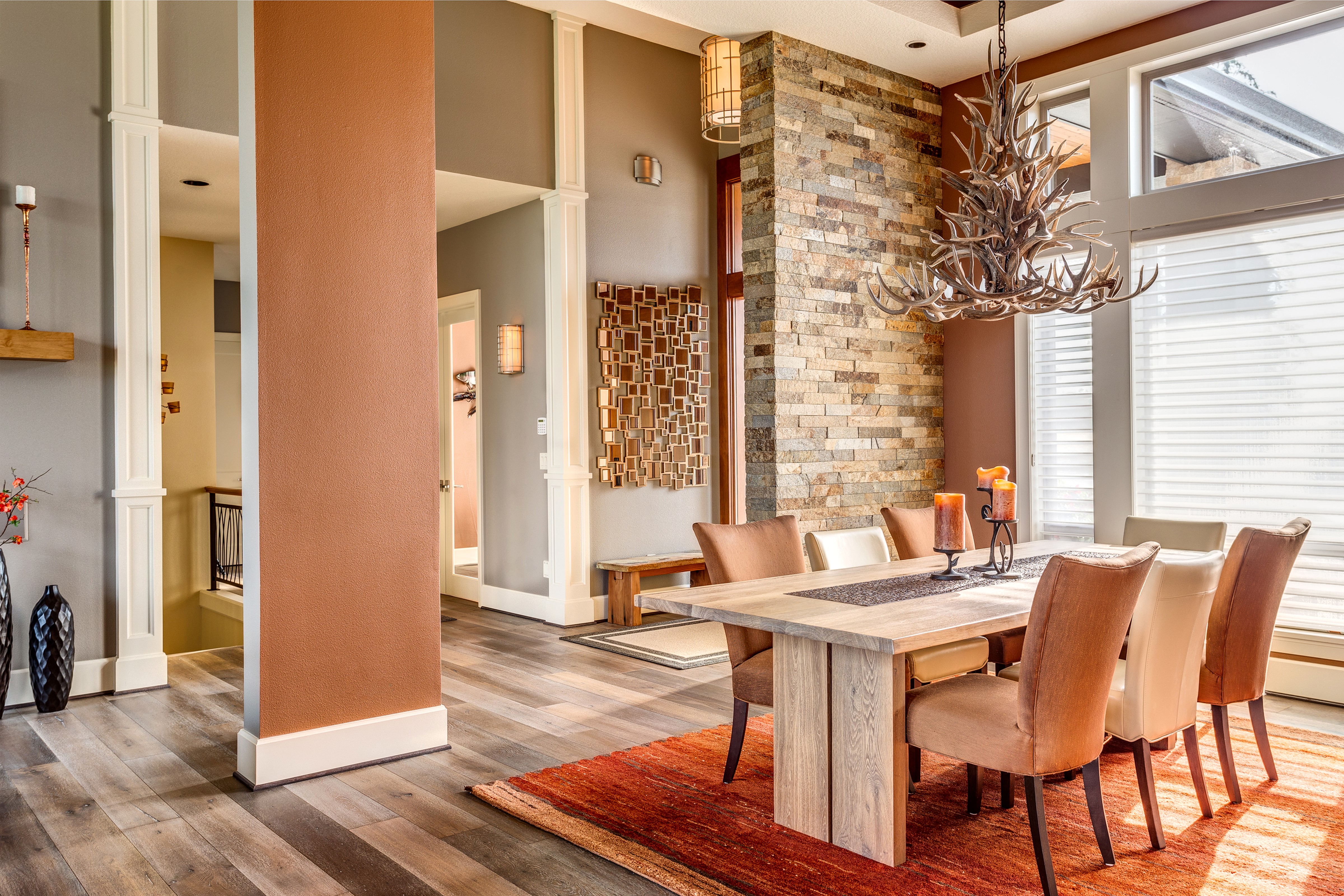 Dining Room with Stone Accent Wall and Antler Chandelier HD Wallpaper
