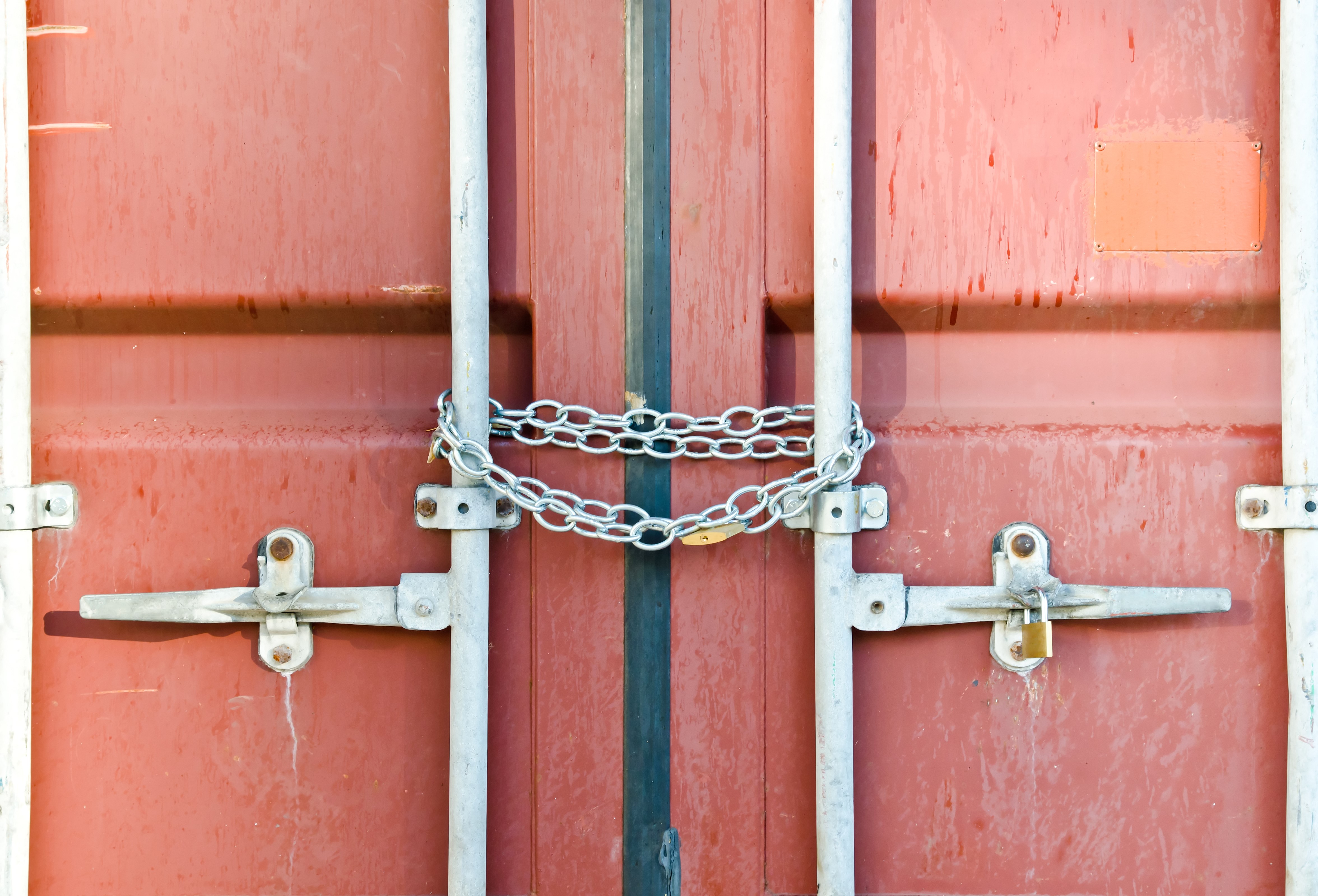Red shipping container doors with chains and locks HD Wallpaper