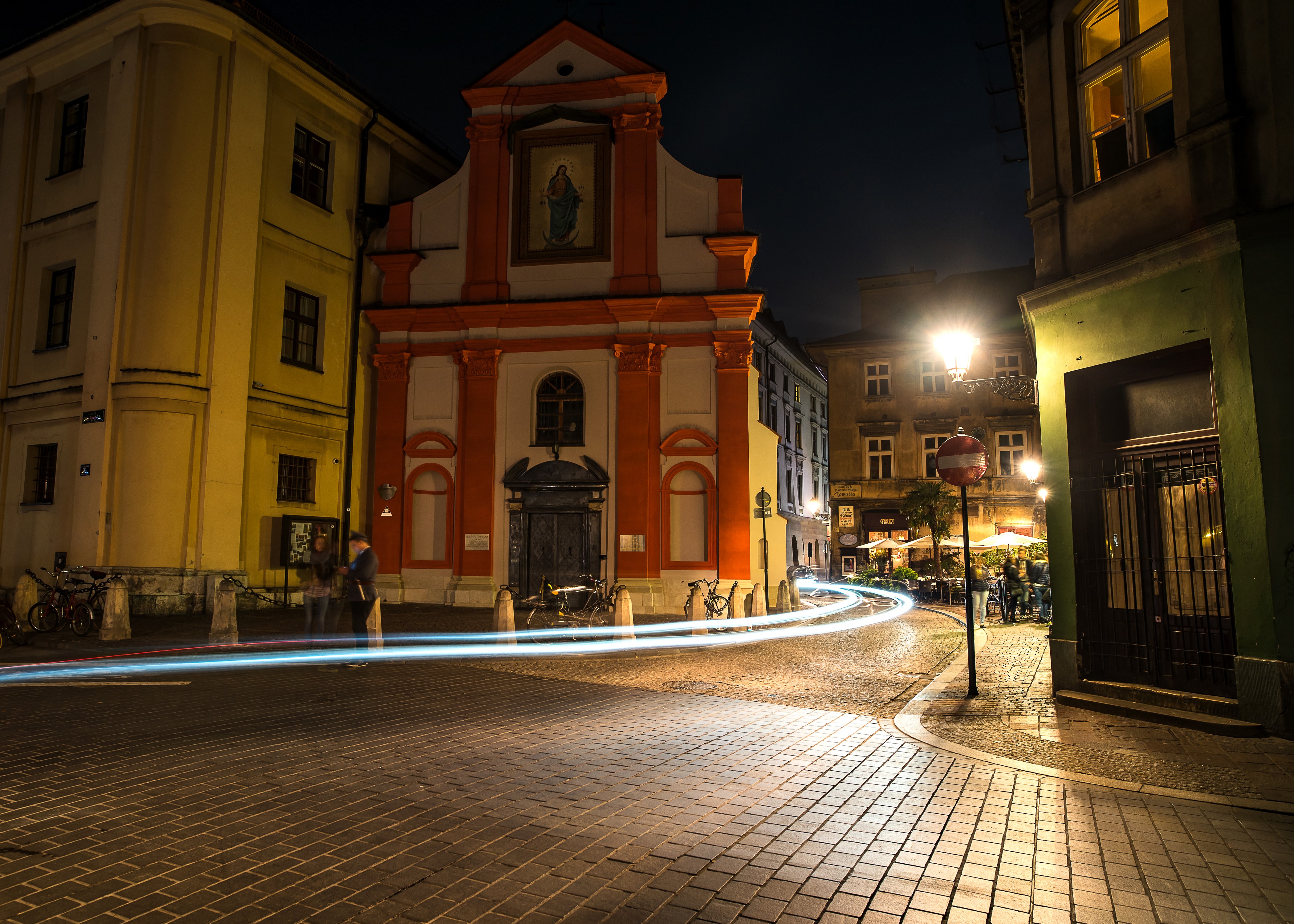 Night street in Krakow, Poland with light trails HD Wallpaper