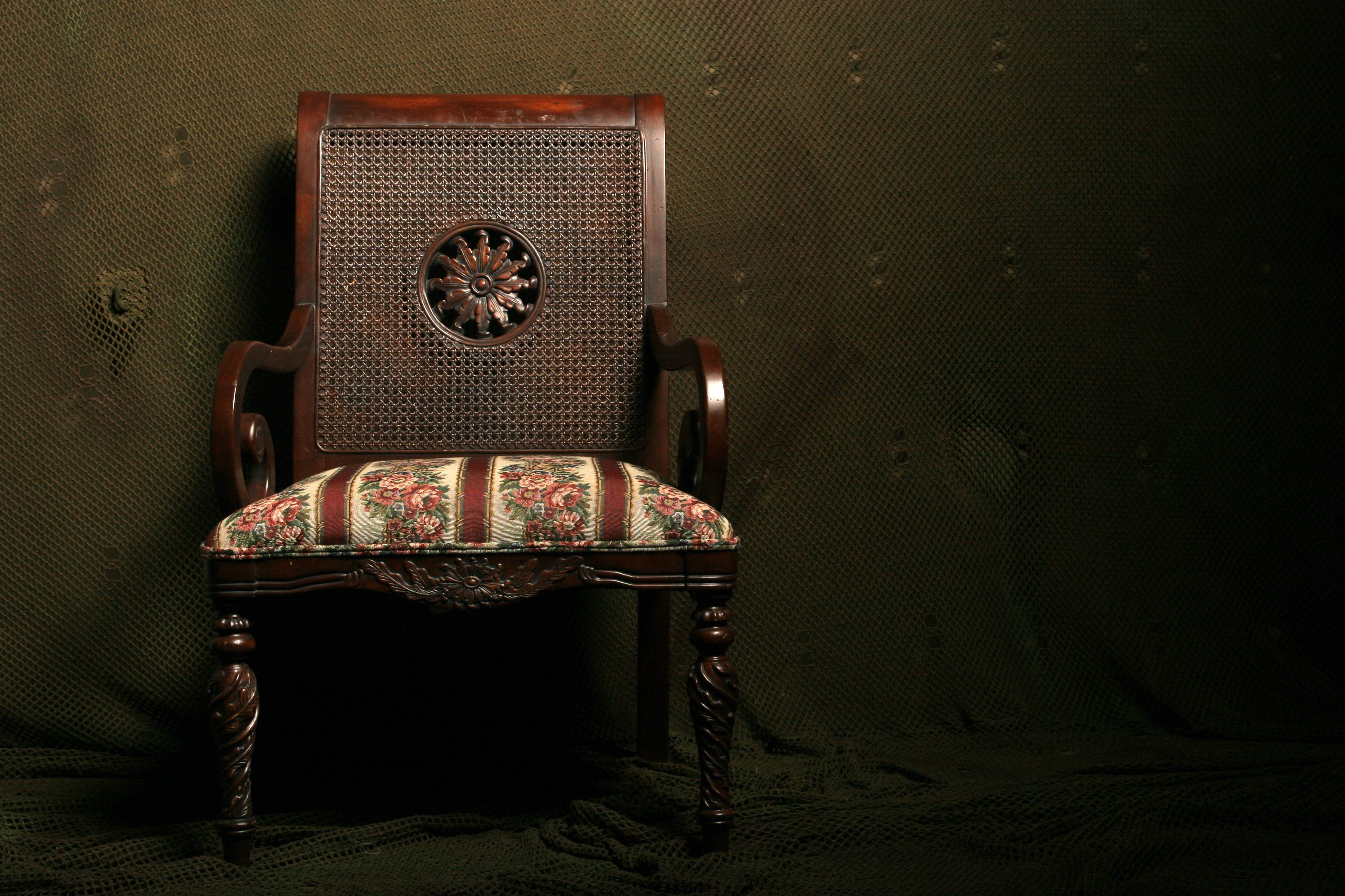 Antique armchair with floral cushion HD Wallpaper