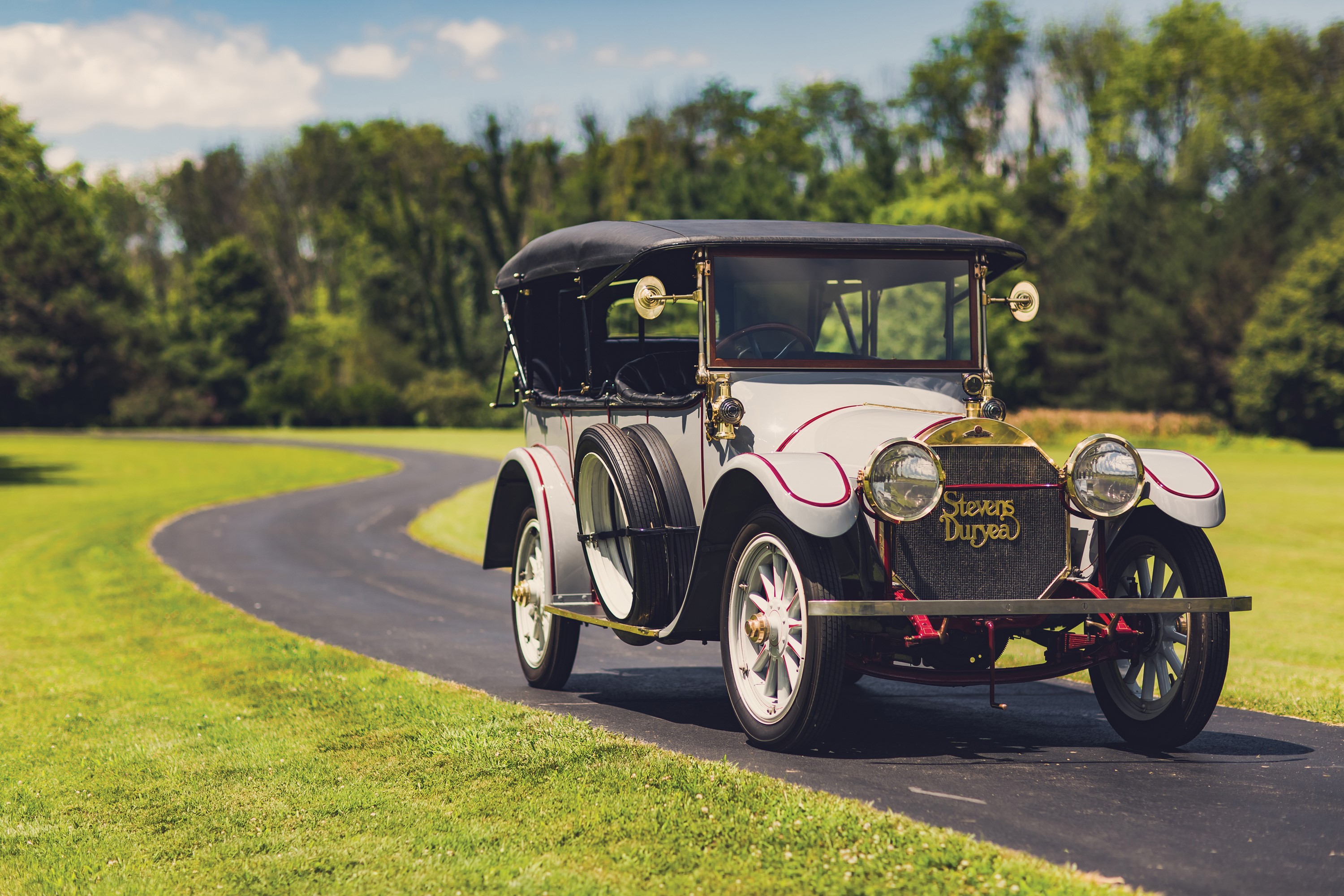1913 Stevens-Duryea Model C-Six Touring Car on Road HD Wallpaper