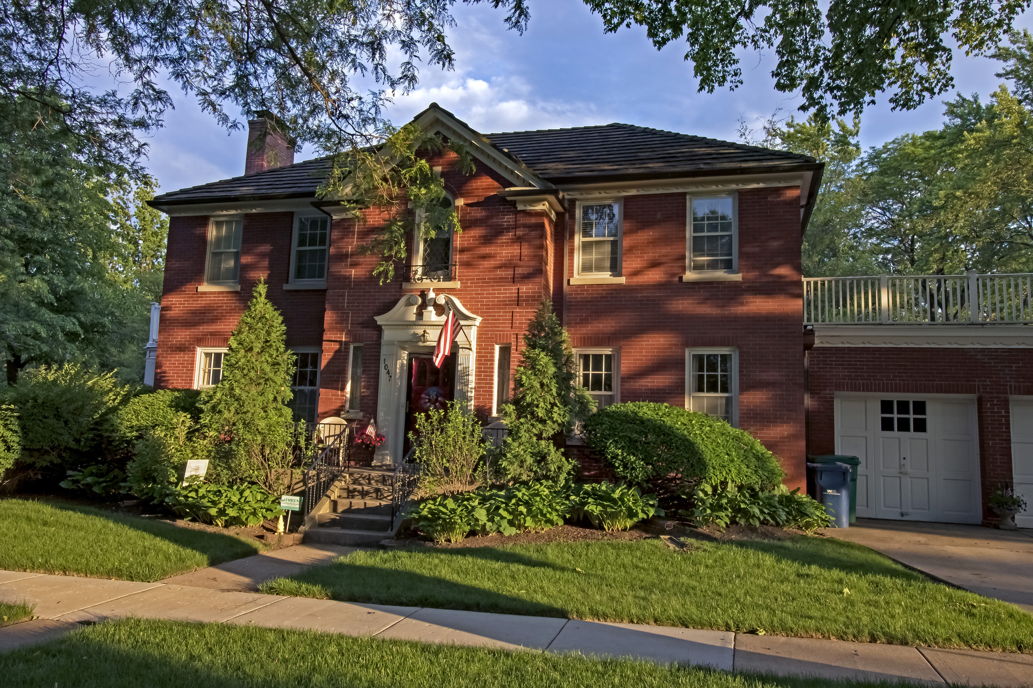 Brick house with garage and balcony in Oak Park, USA HD Wallpaper