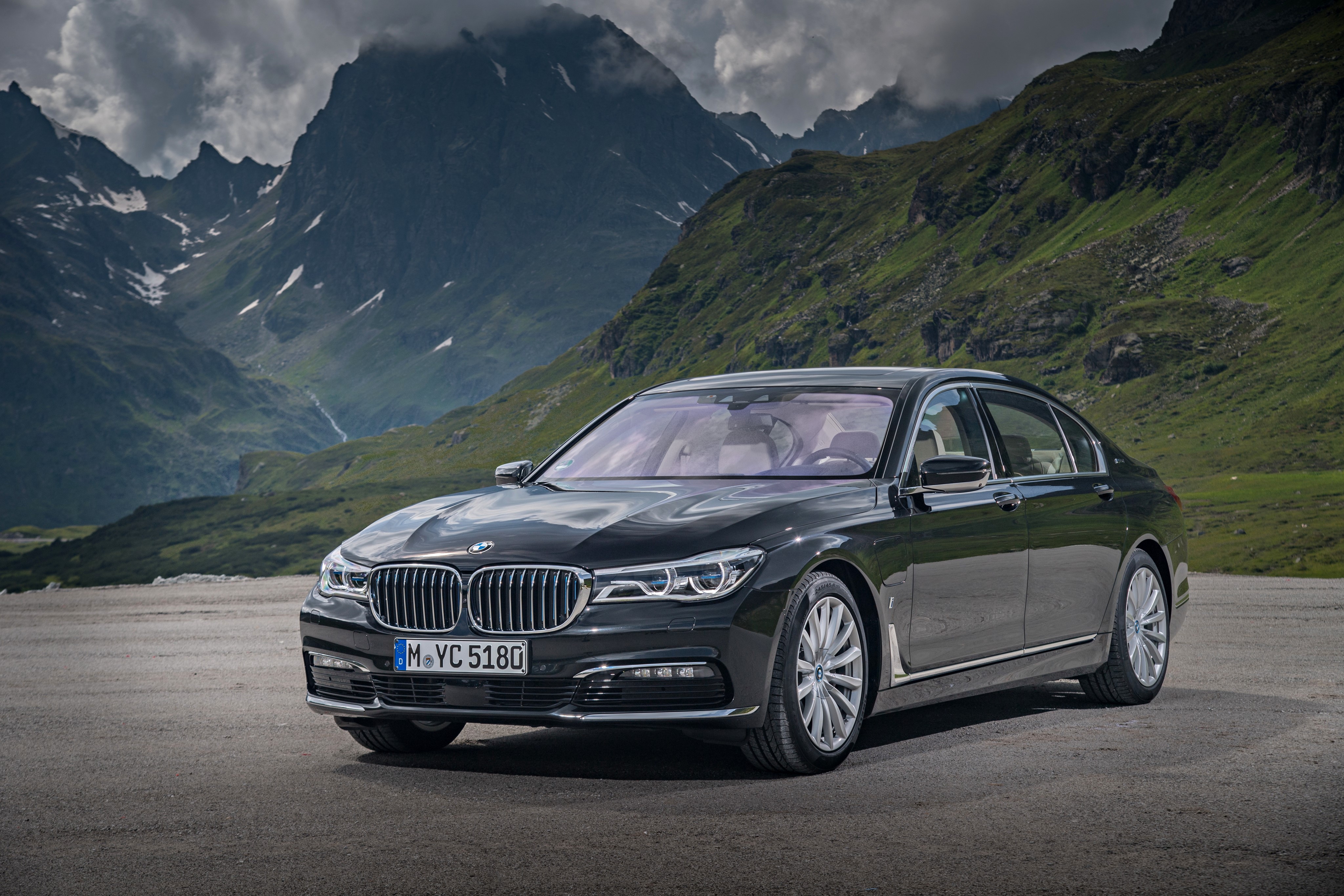 4K BMW 740Le Metallic in Mountains HD Wallpaper
