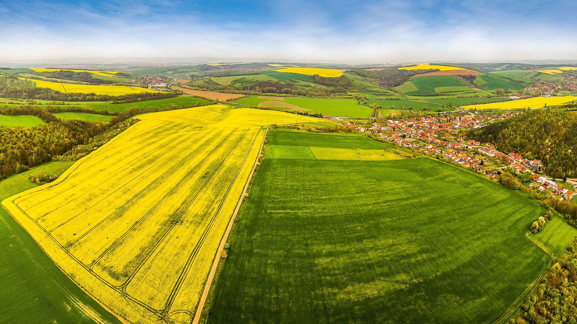 Aerial view of Hradcovice, Czech Republic with fields and houses HD Wallpaper
