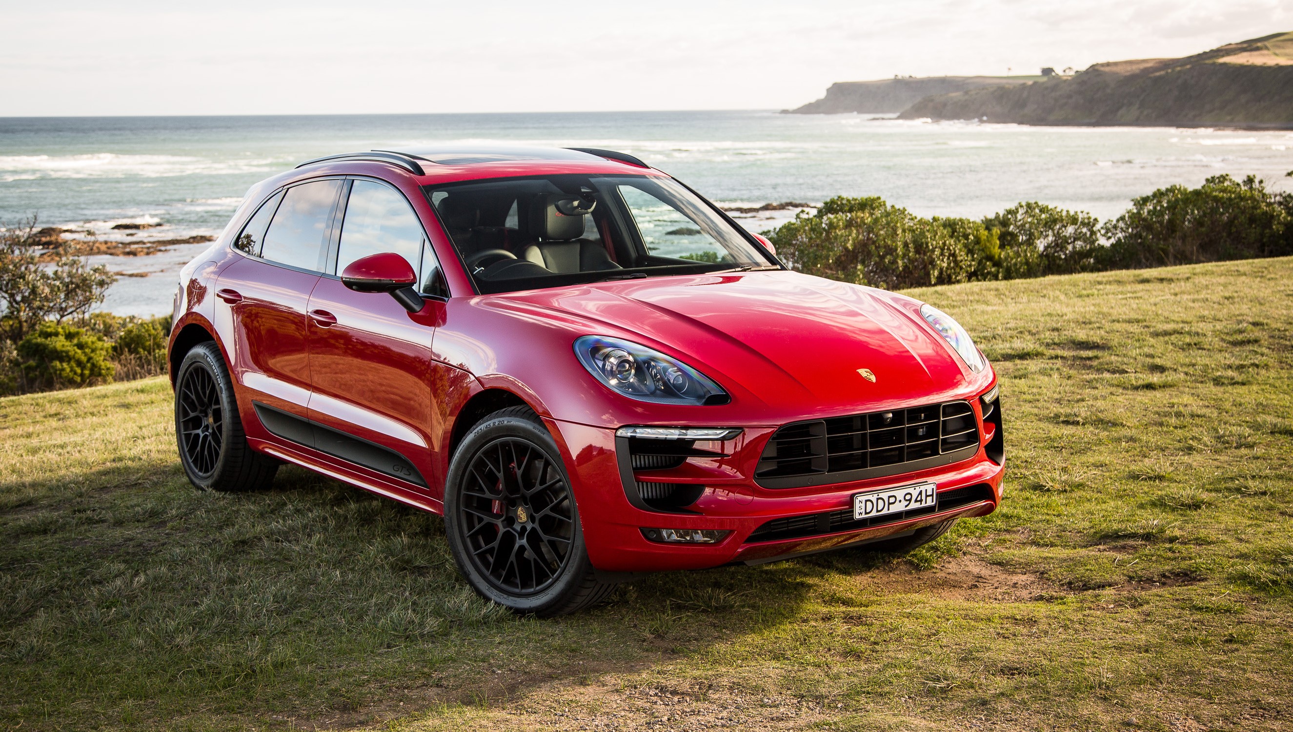 Red 2016 Porsche Macan GTS by the ocean HD Wallpaper