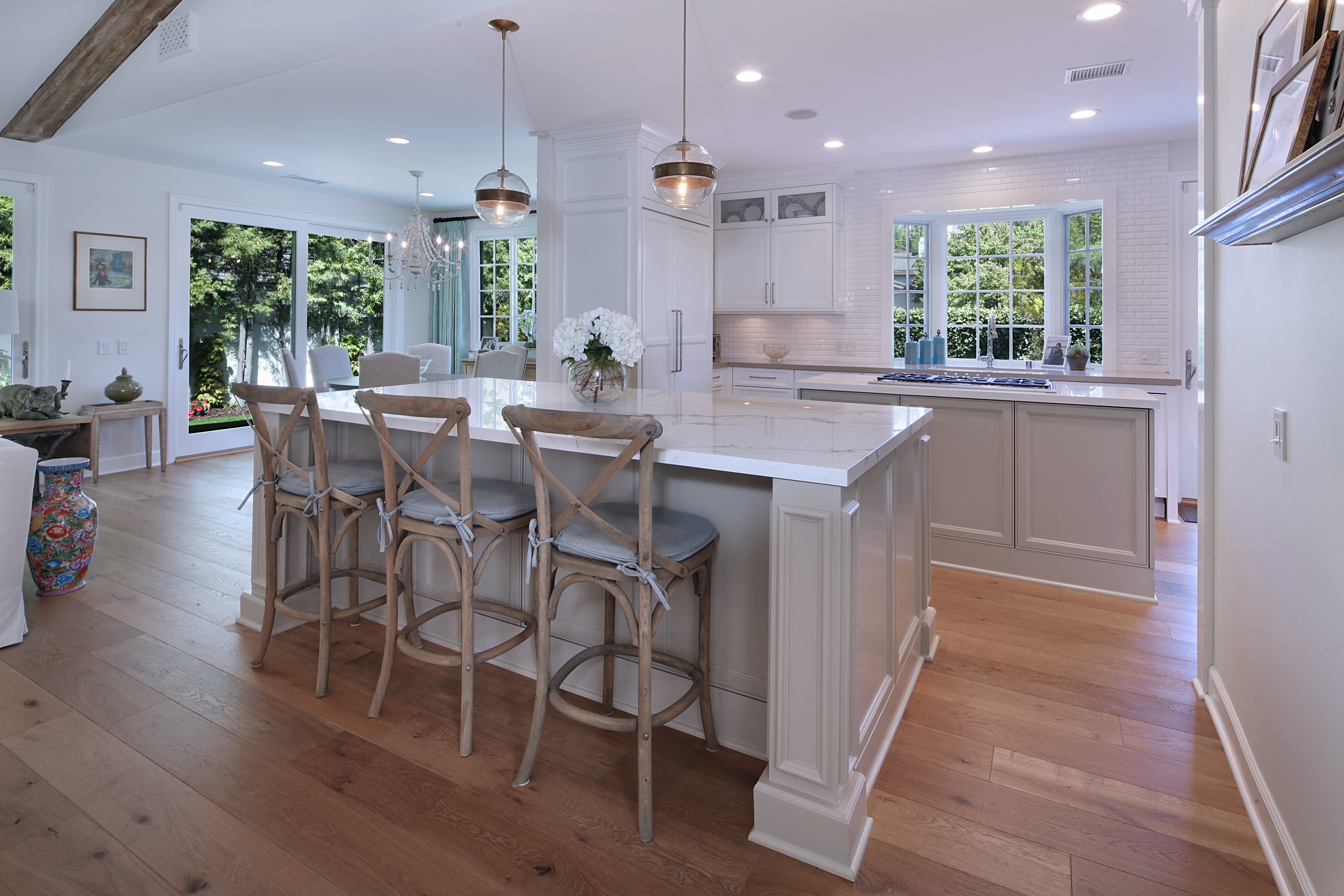 Modern kitchen with island and dining area HD Wallpaper