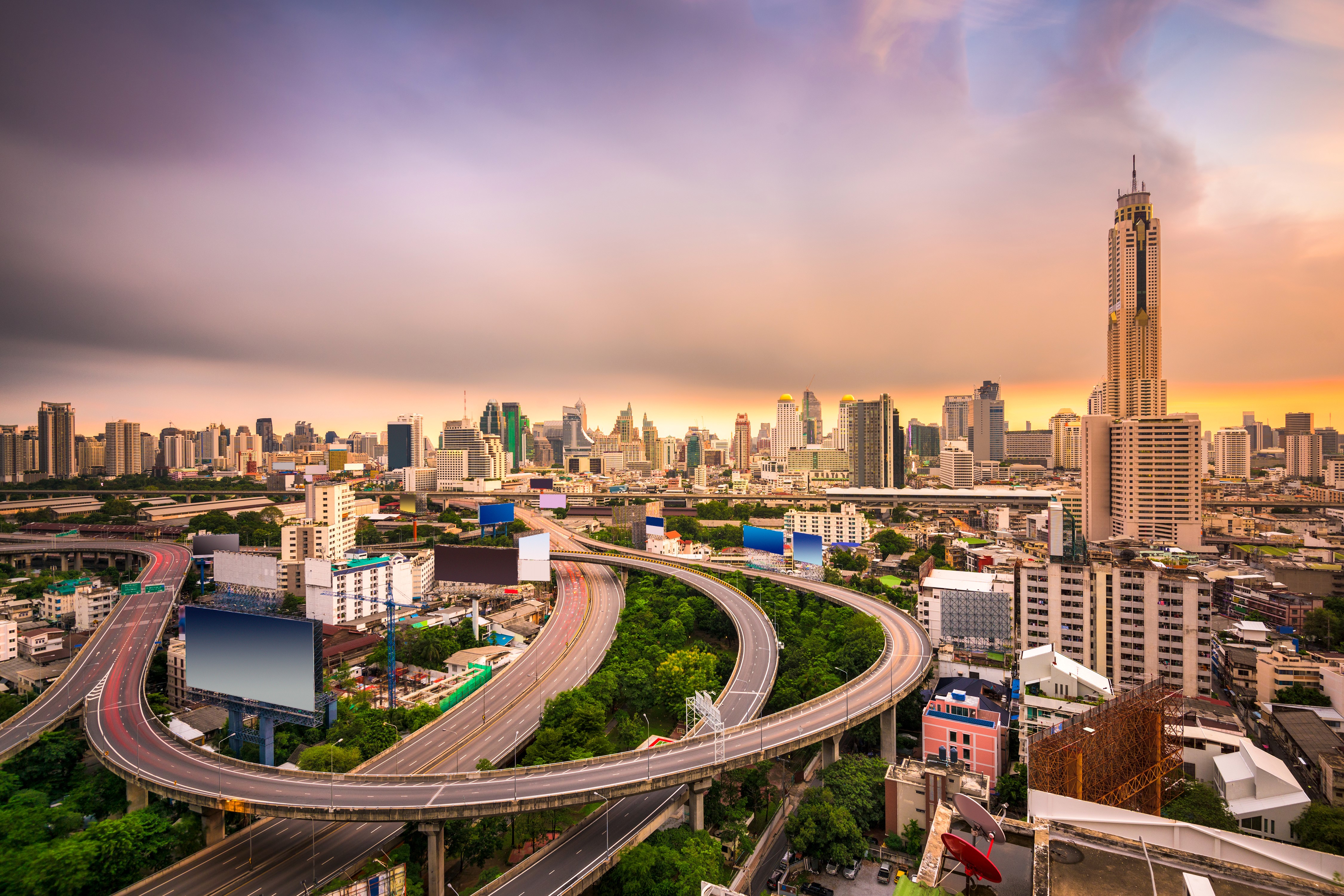 Bangkok, Thailand Skyscrapers and Highway Interchange at Sunset HD Wallpaper