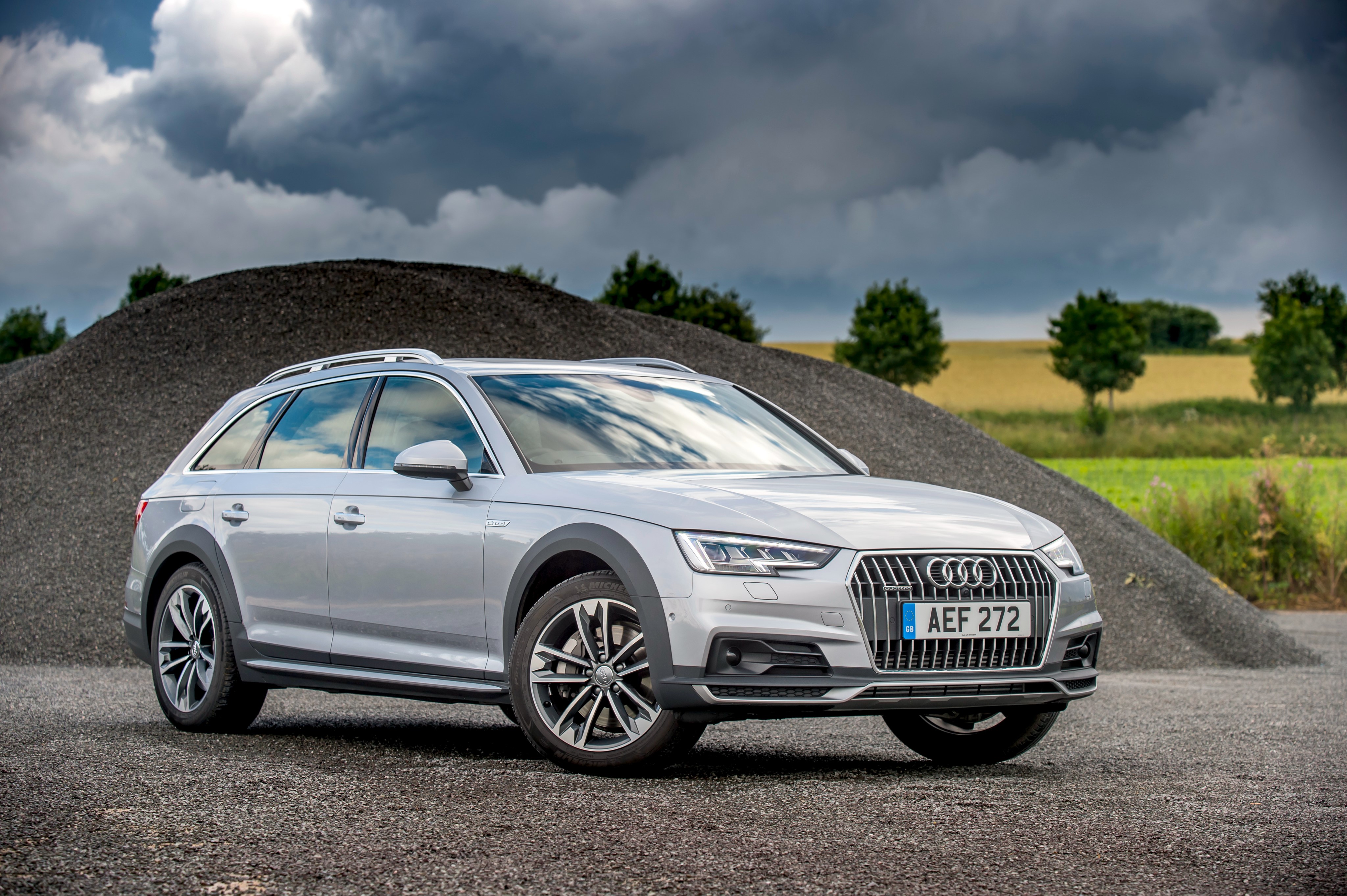 Silver Audi A4 Allroad 3.0 TDI quattro parked outdoors HD Wallpaper