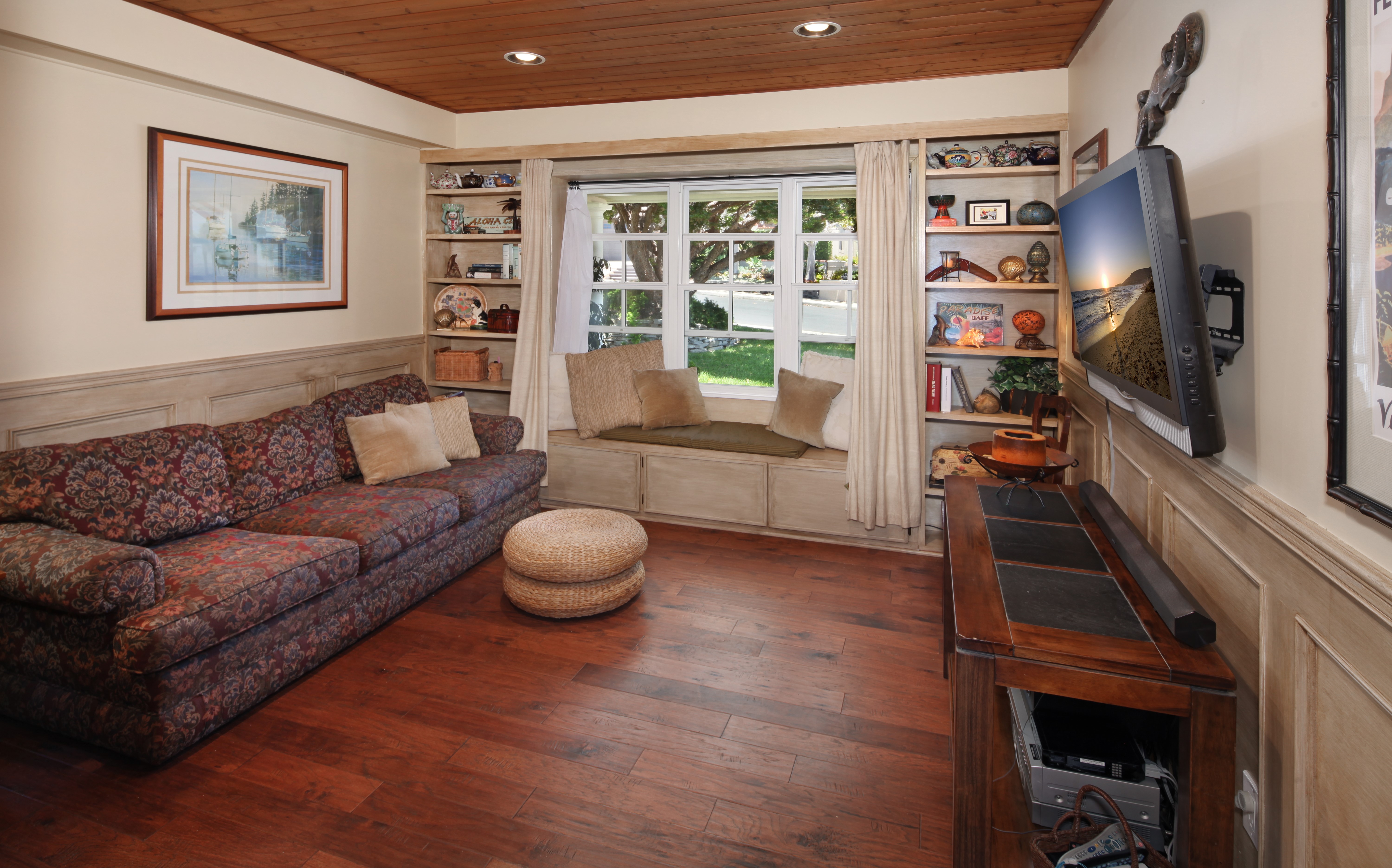 Living room with sofa and TV HD Wallpaper