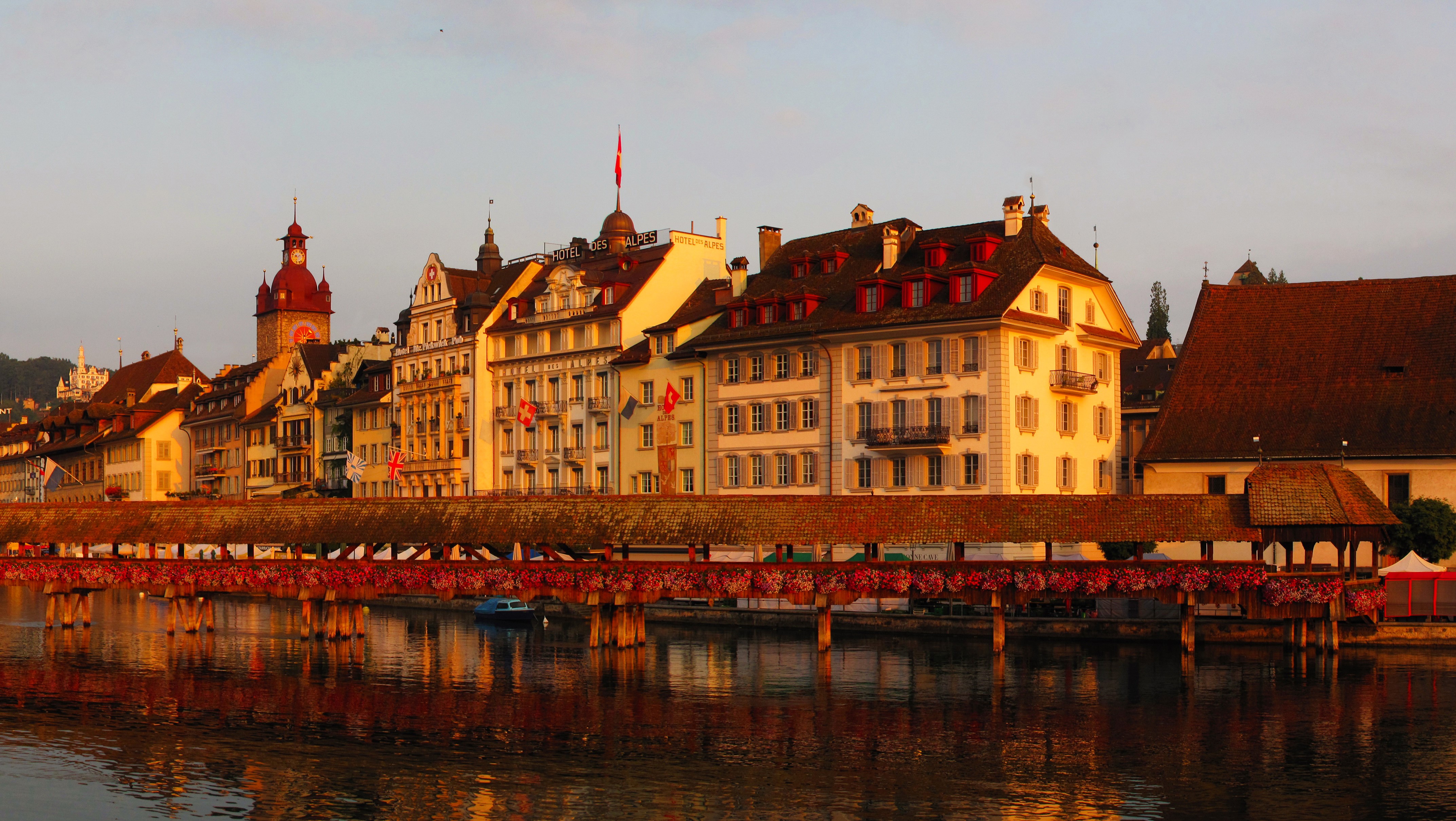 Chapel Bridge and Old Town in Lucerne, Switzerland HD Wallpaper