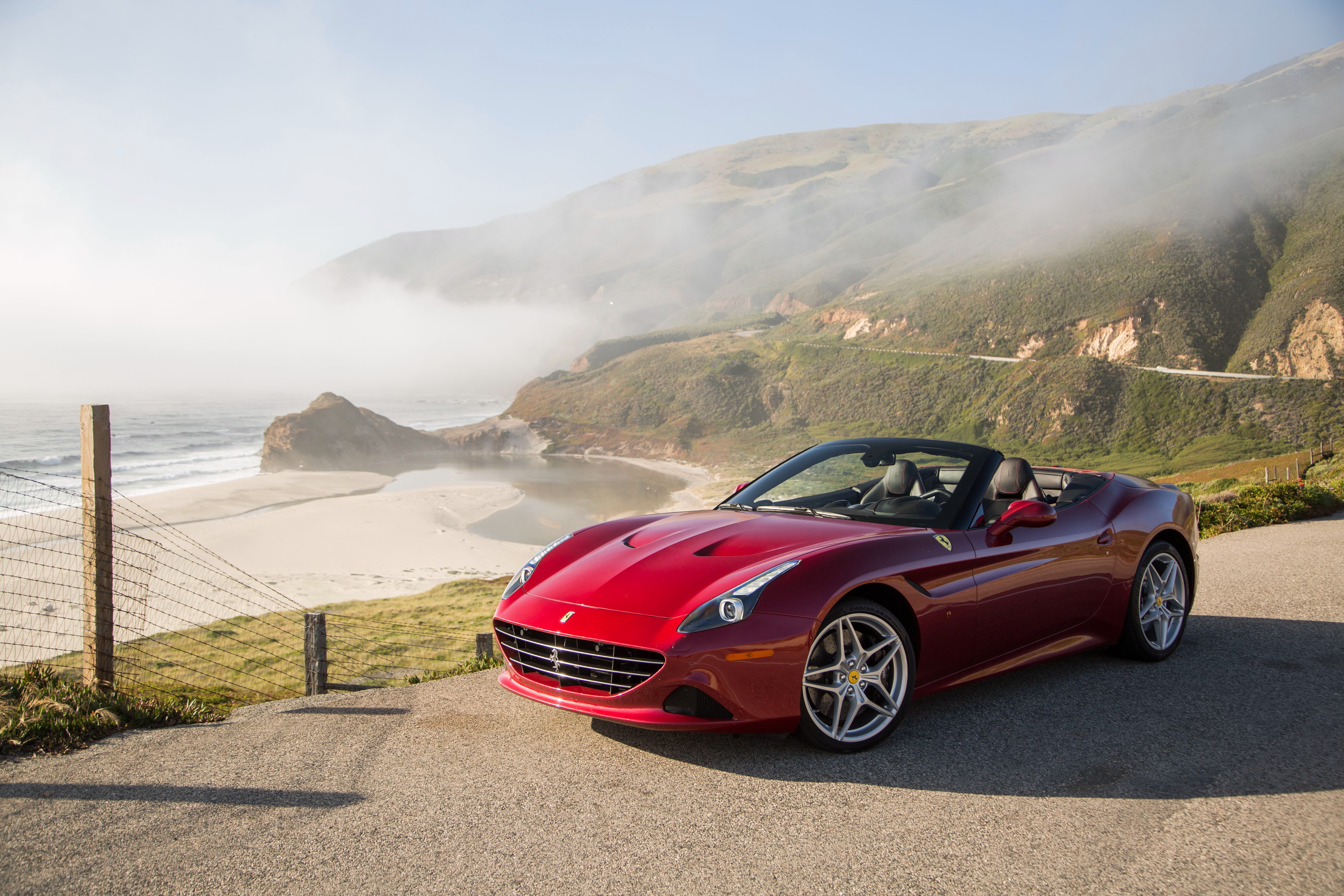 Red Ferrari California Cabriolet on Coastal Road HD Wallpaper