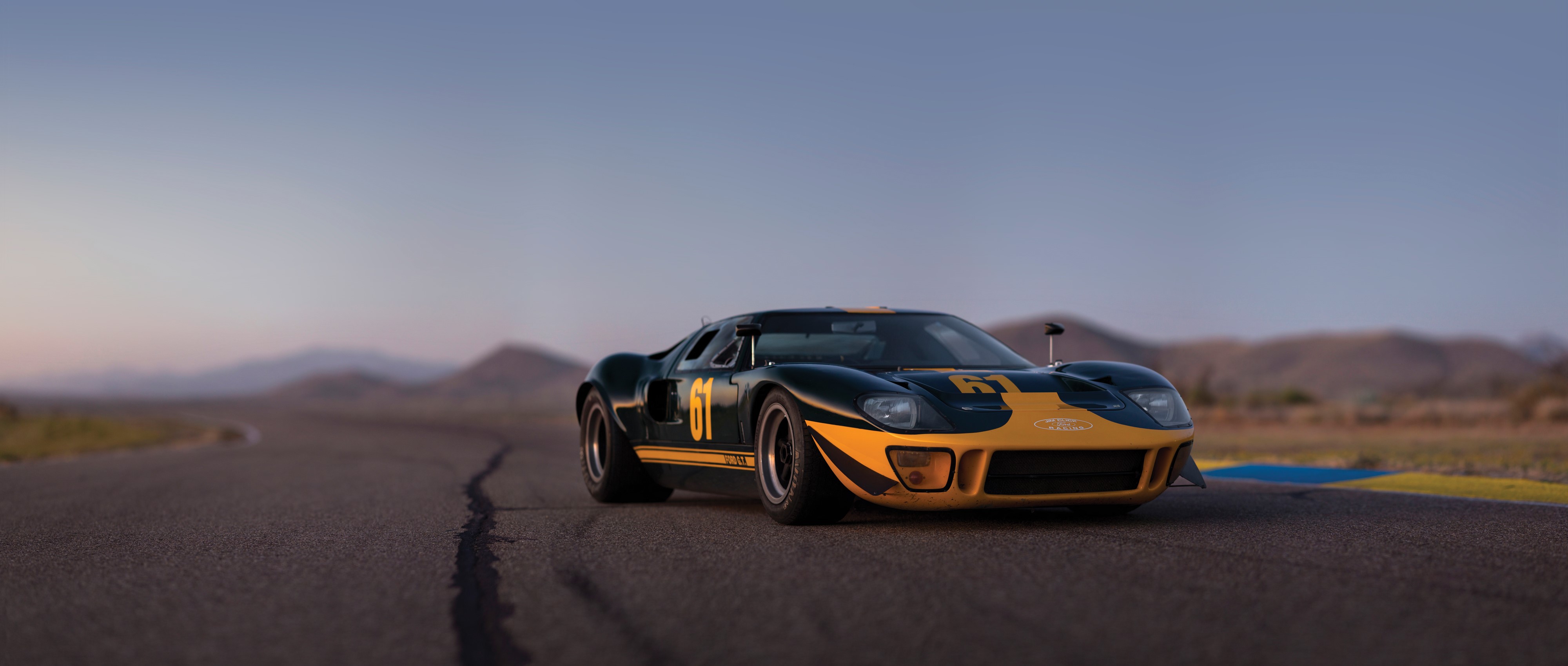 1966 Ford GT40 on a race track HD Wallpaper