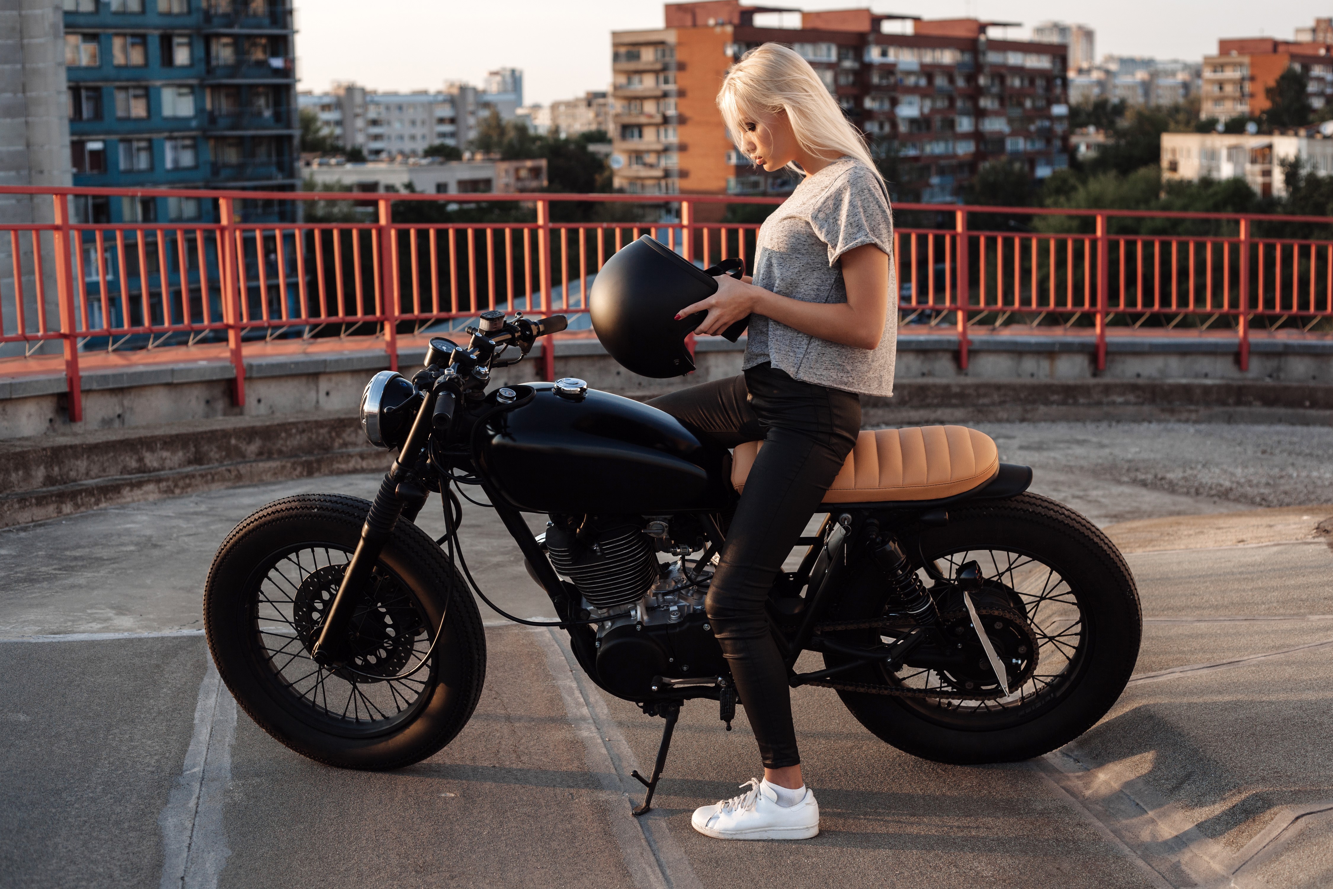 Blonde girl with helmet and motorcycle on rooftop HD Wallpaper
